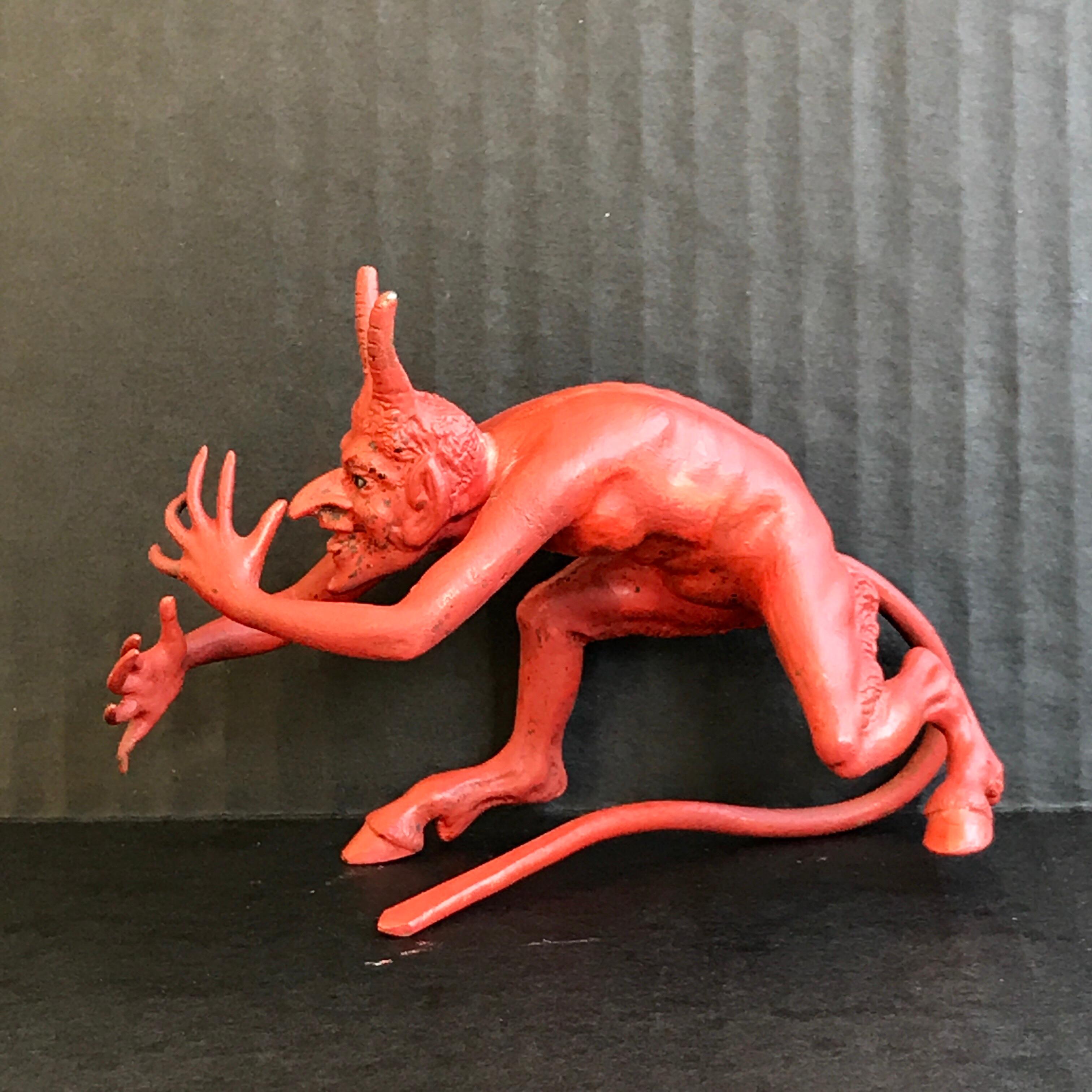 Cold painted Austrian bronze devil, attributed to Bergman , realistically modeled, whimsical crouching devil thumbing his nose. Unmarked.