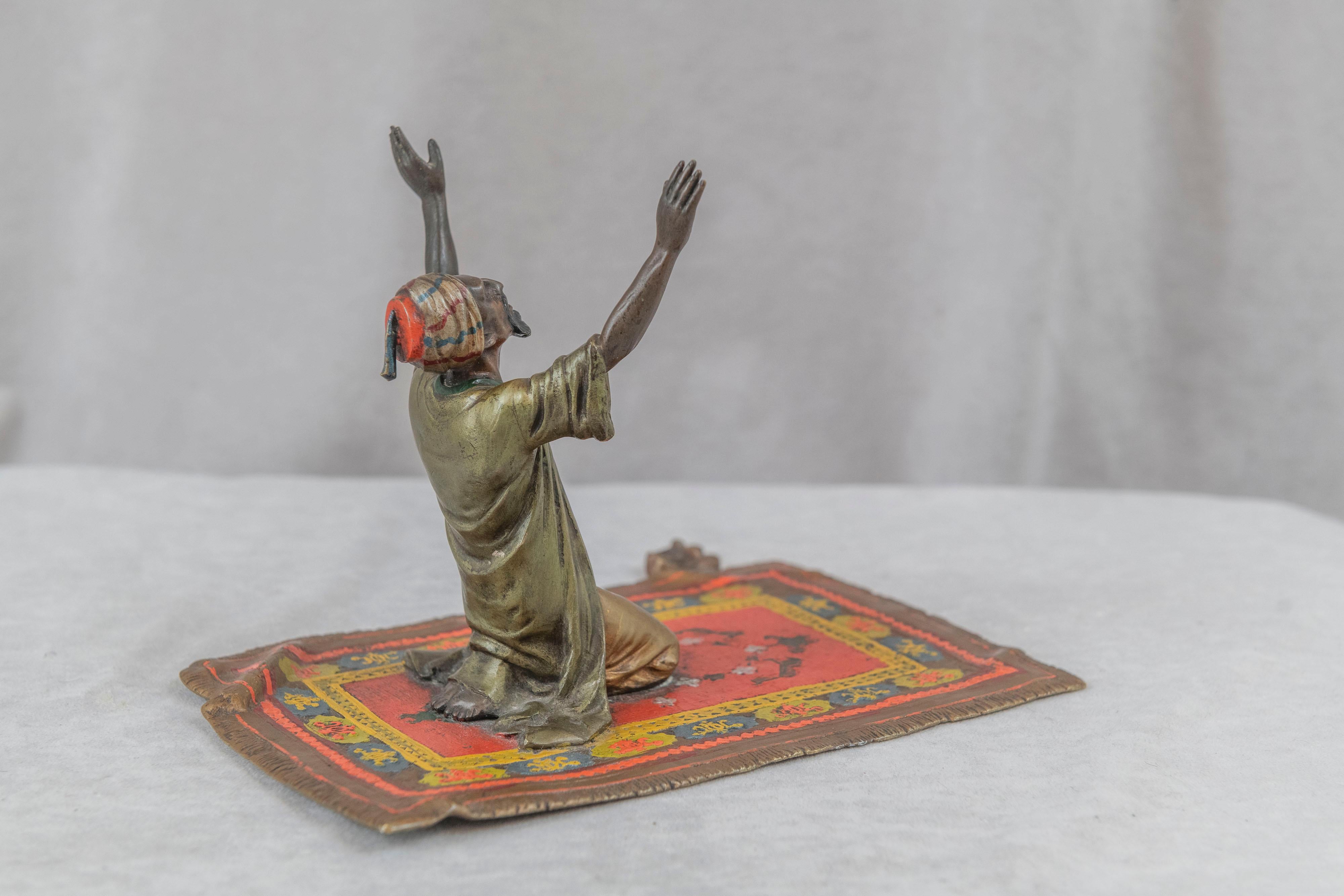 Early 20th Century Cold Painted Austrian Orientalist Man on Rug in Prayer, Bergmann, ca. 1915 For Sale