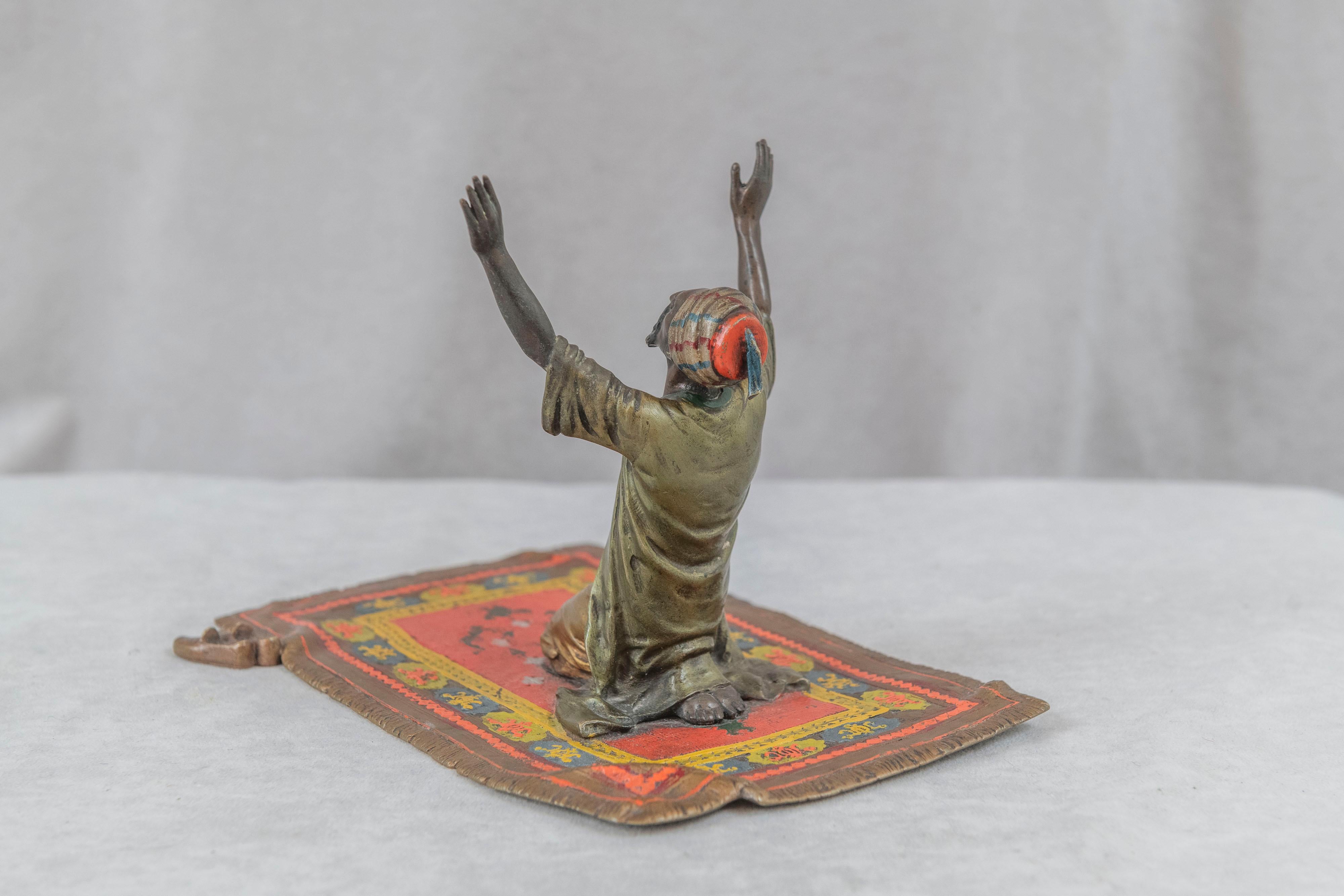 Bronze Cold Painted Austrian Orientalist Man on Rug in Prayer, Bergmann, ca. 1915 For Sale