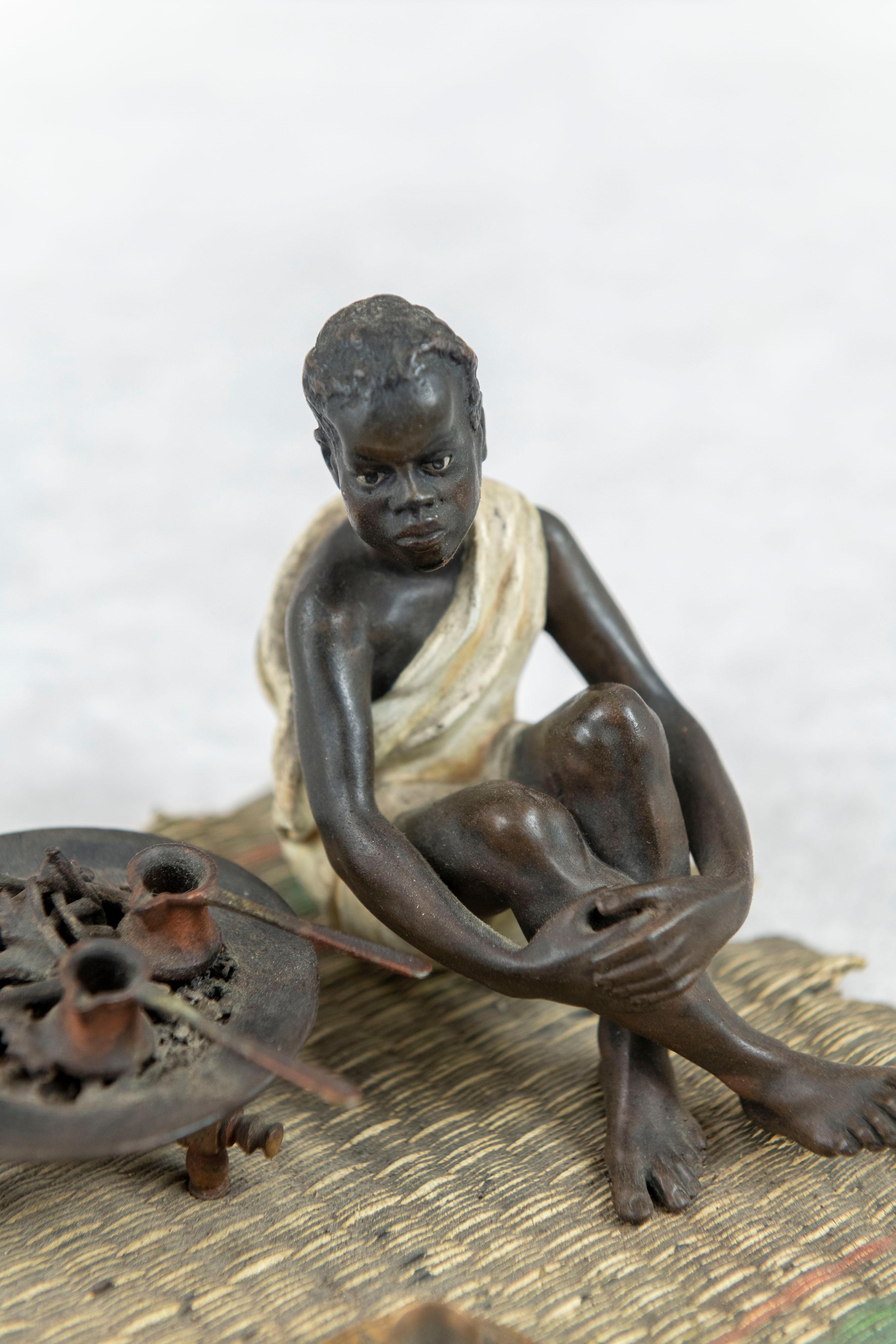 Cast Cold Painted Austrian Orientalist Seated Young Boy Cooking, Bergmann Foundry For Sale
