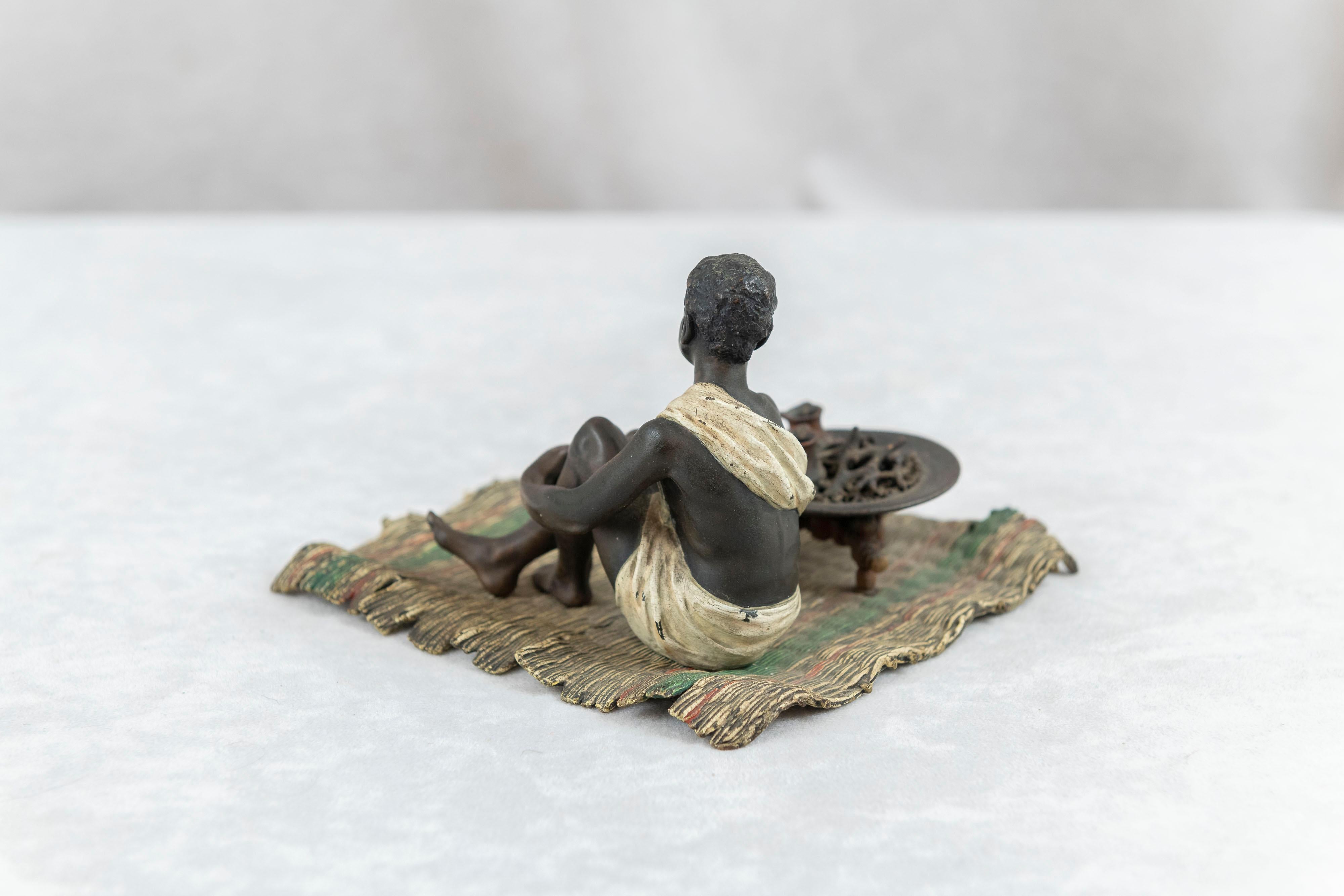 Bronze Cold Painted Austrian Orientalist Seated Young Boy Cooking, Bergmann Foundry For Sale