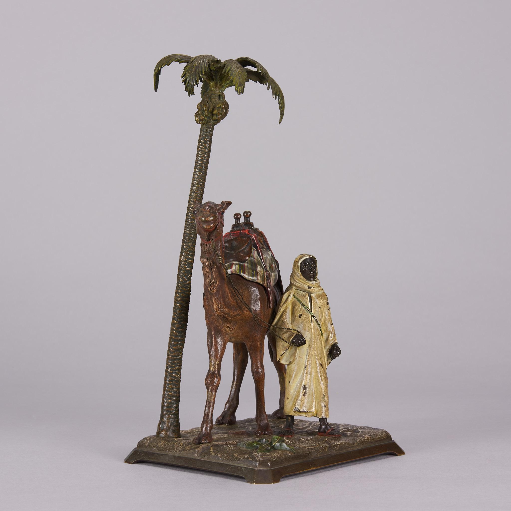 Cold bemalte Bronze mit dem Titel „Bedouin mit Kamel unter Palmenbaum“ von Bergman (Österreichisch) im Angebot