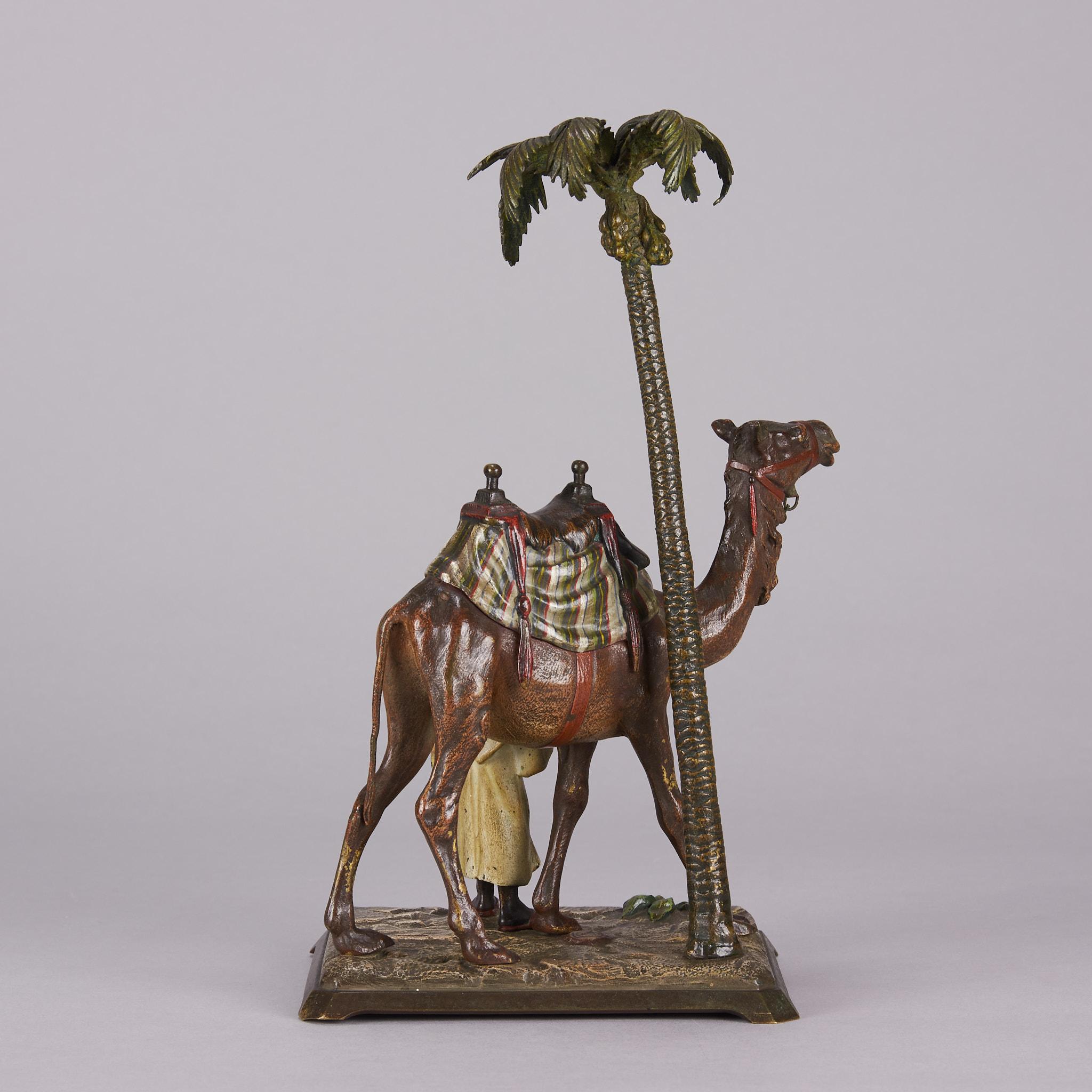Début du 20ème siècle Bronze peint à froid intitulé « Bedouin with Camel under Palm Tree » (Bedouin avec camel sous palmier) par Bergman en vente