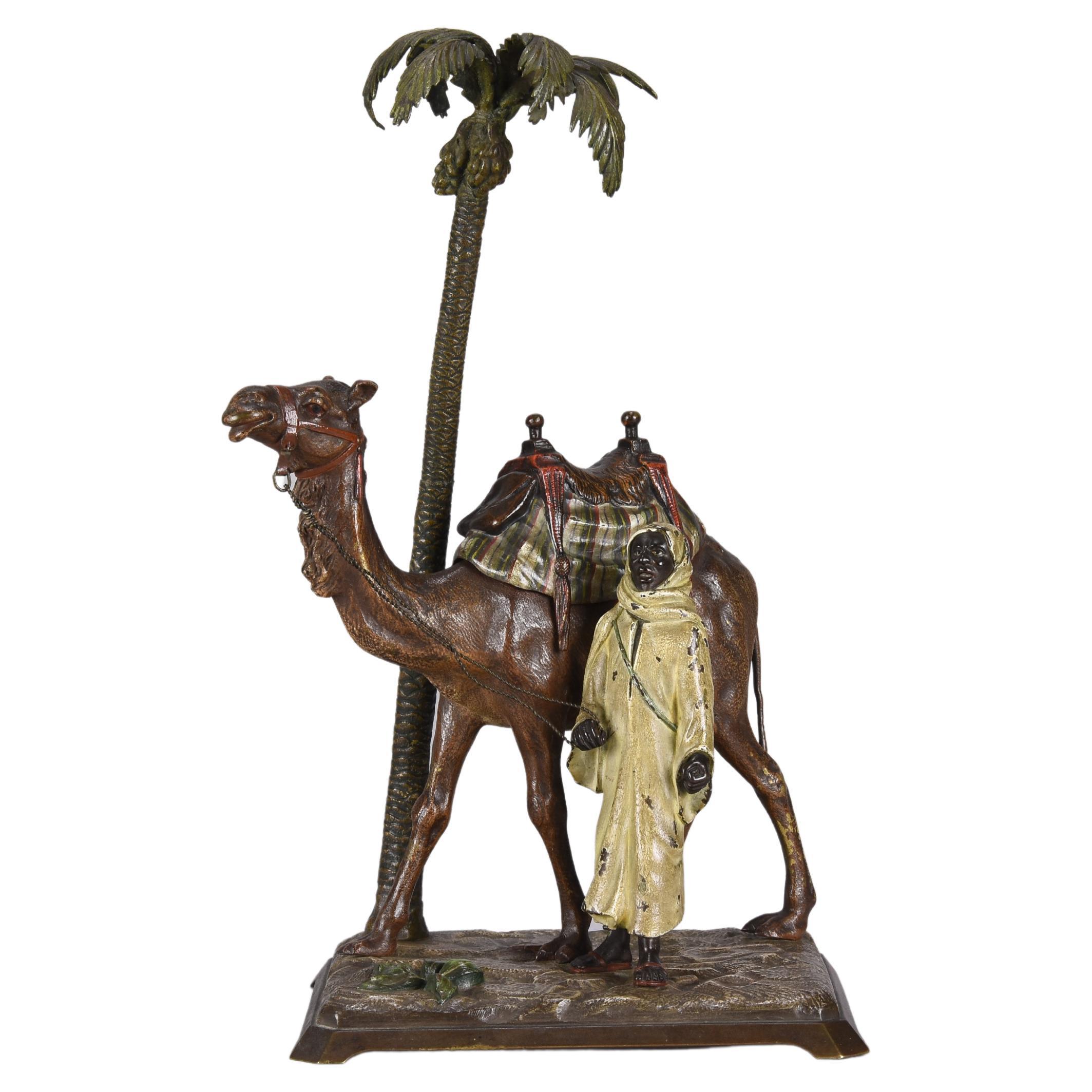 Cold Painted Bronze Entitled "Bedouin with Camel under Palm Tree" by Bergman