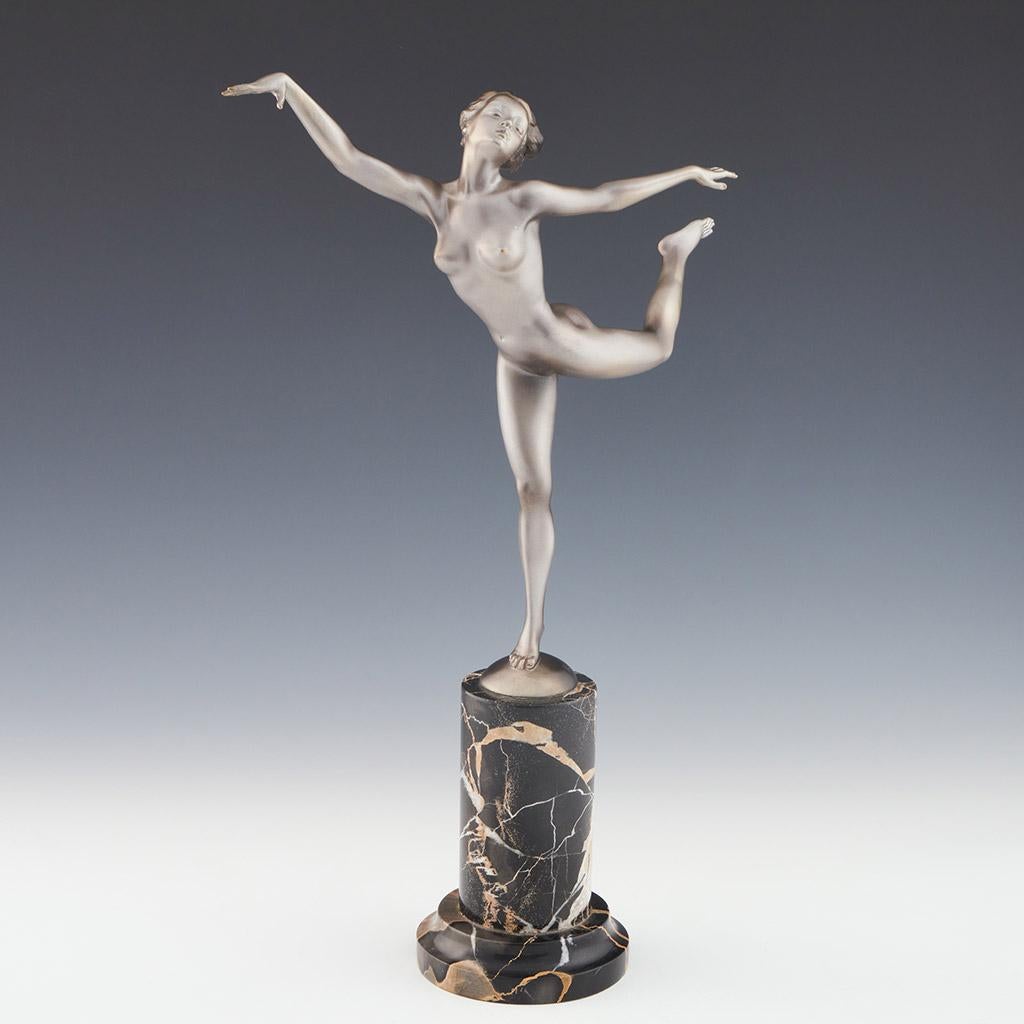 An Art Deco, cold painted bronze figure by Josef Lorenzl (1892-1950). A dancing woman in stylised pose set over a marble plinth.

Signed to bronze.

Dimensions: H 37cm, W 26cm, D 11cm

Origin: Austrian

Date: circa 1930

Josef Lorenzl, born