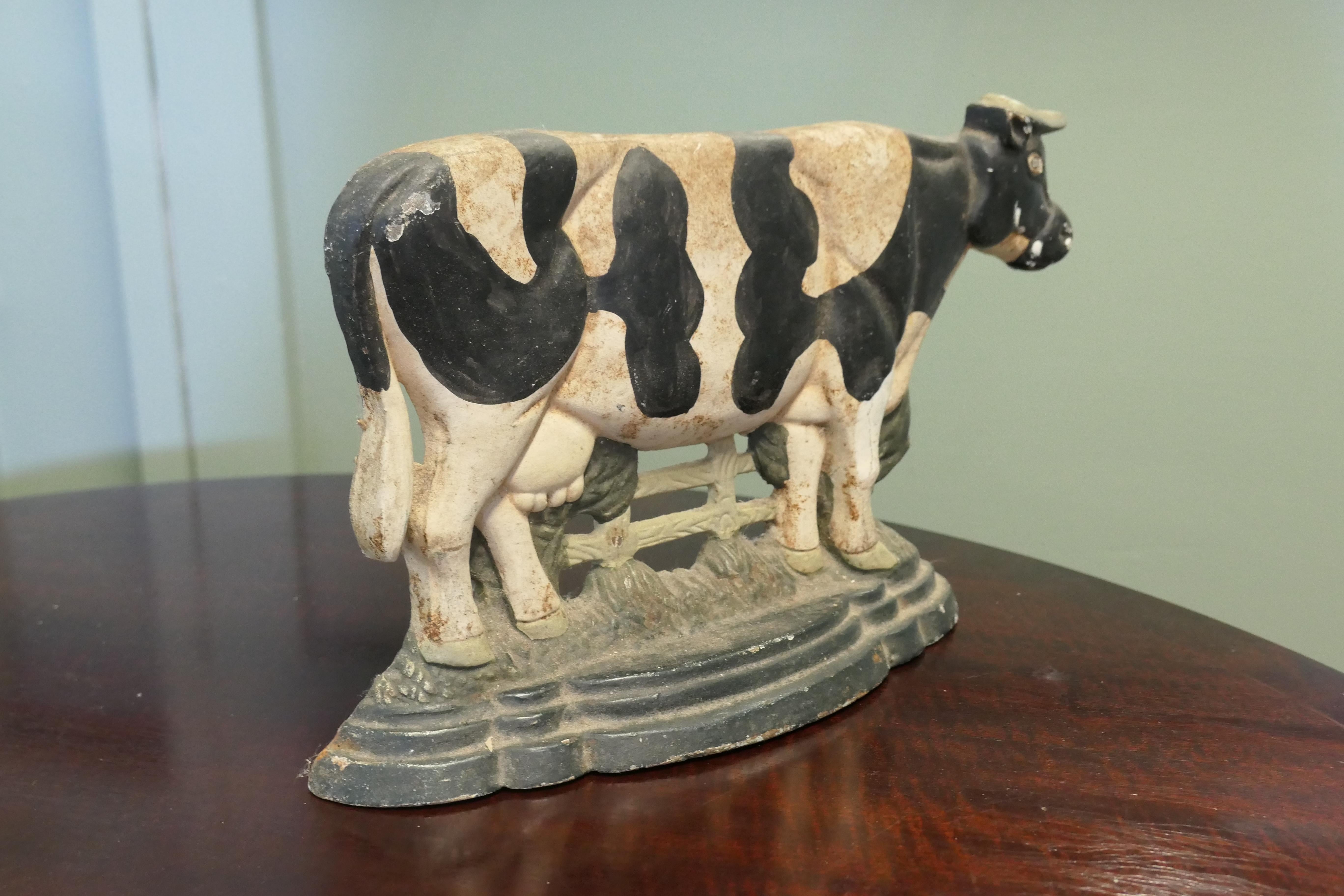 Early 20th Century Cold Painted Cast Iron Door Stop, Cow at the Gate  Needless to say a heavy piece For Sale