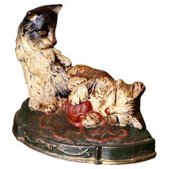Cold Painted Cast Iron Door Stop, with Kittens Needless to say a heavy piece