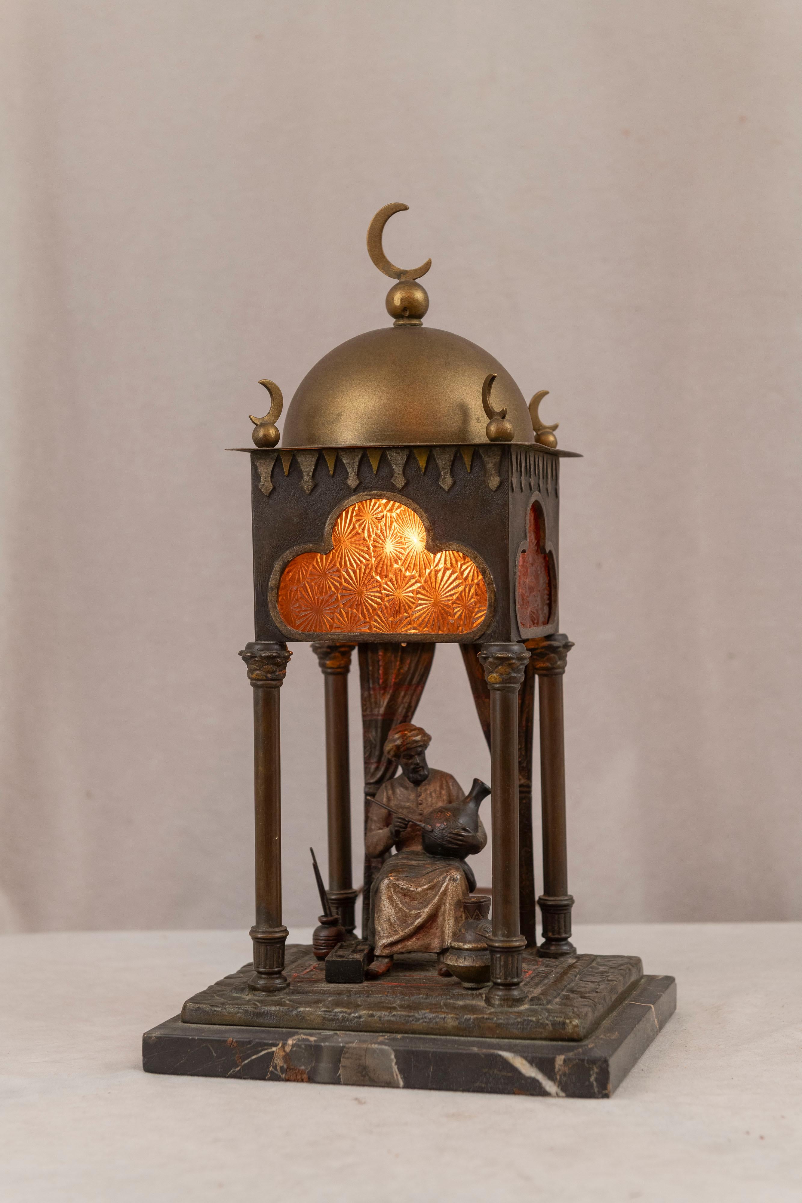  This Vienna bronze lamp has all the features that make it desirable. Detailed casting, meticulously painted, excellent subject matter, marble base, and really wonderful unusual glass. When lit up it puts a smile on your face. A very fine example of