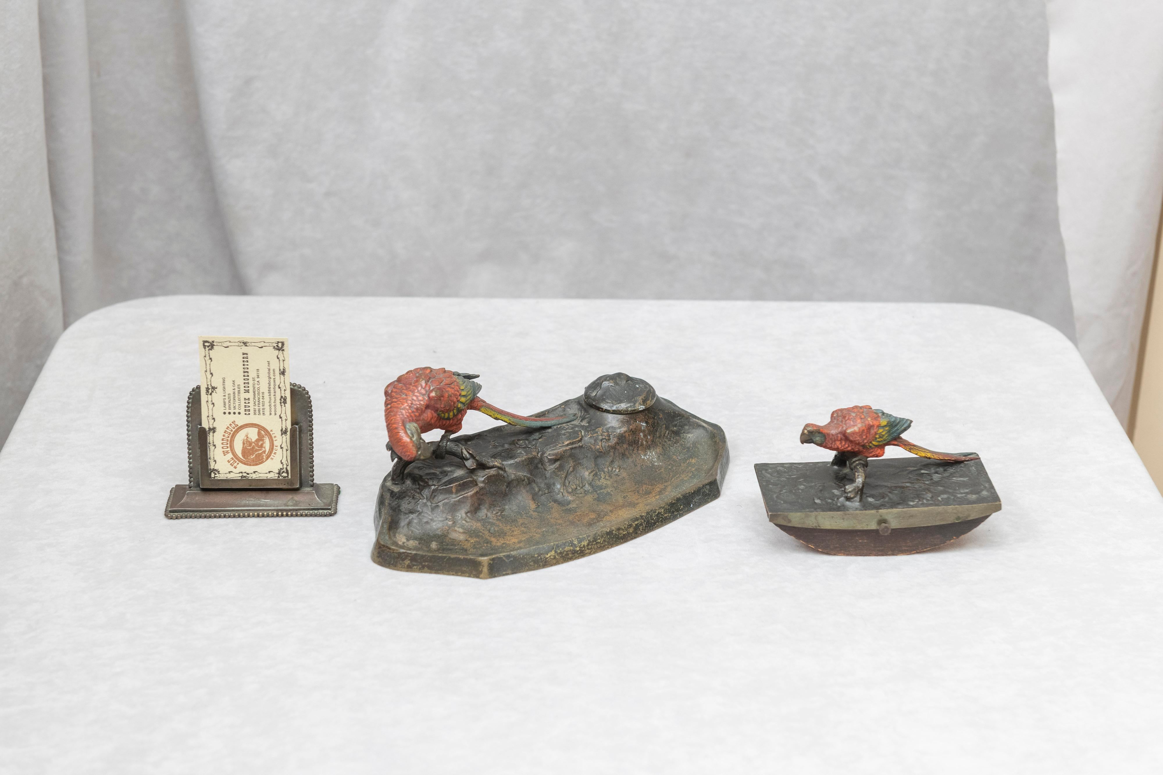 This 2-piece desk consists of an inkwell, with the original ceramic insert, and a rocker blotter. Both items are marked 