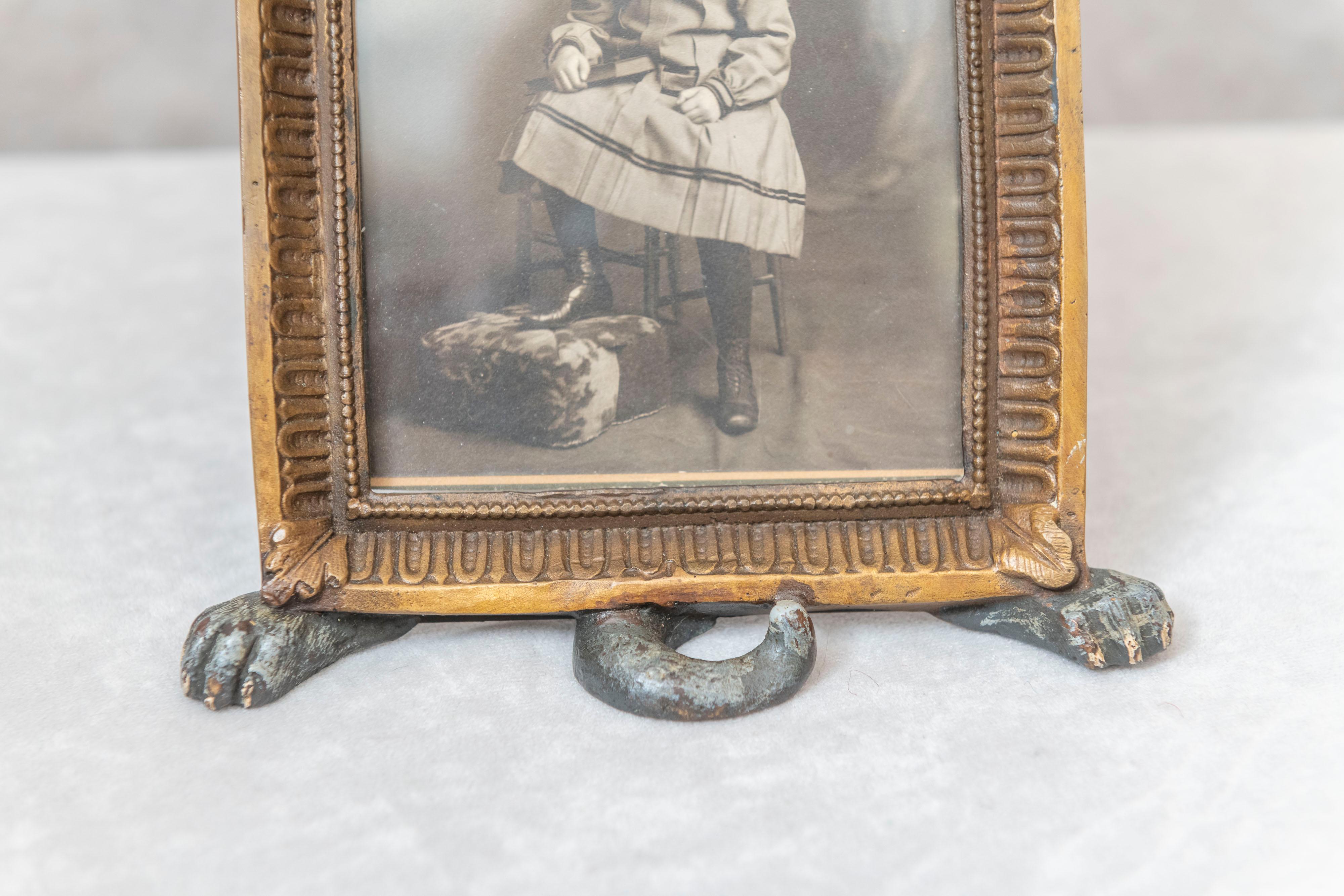 Belle Époque Cold Painted Vienna Bronze Figure of a Cat Holding a Picture Frame, circa 1910
