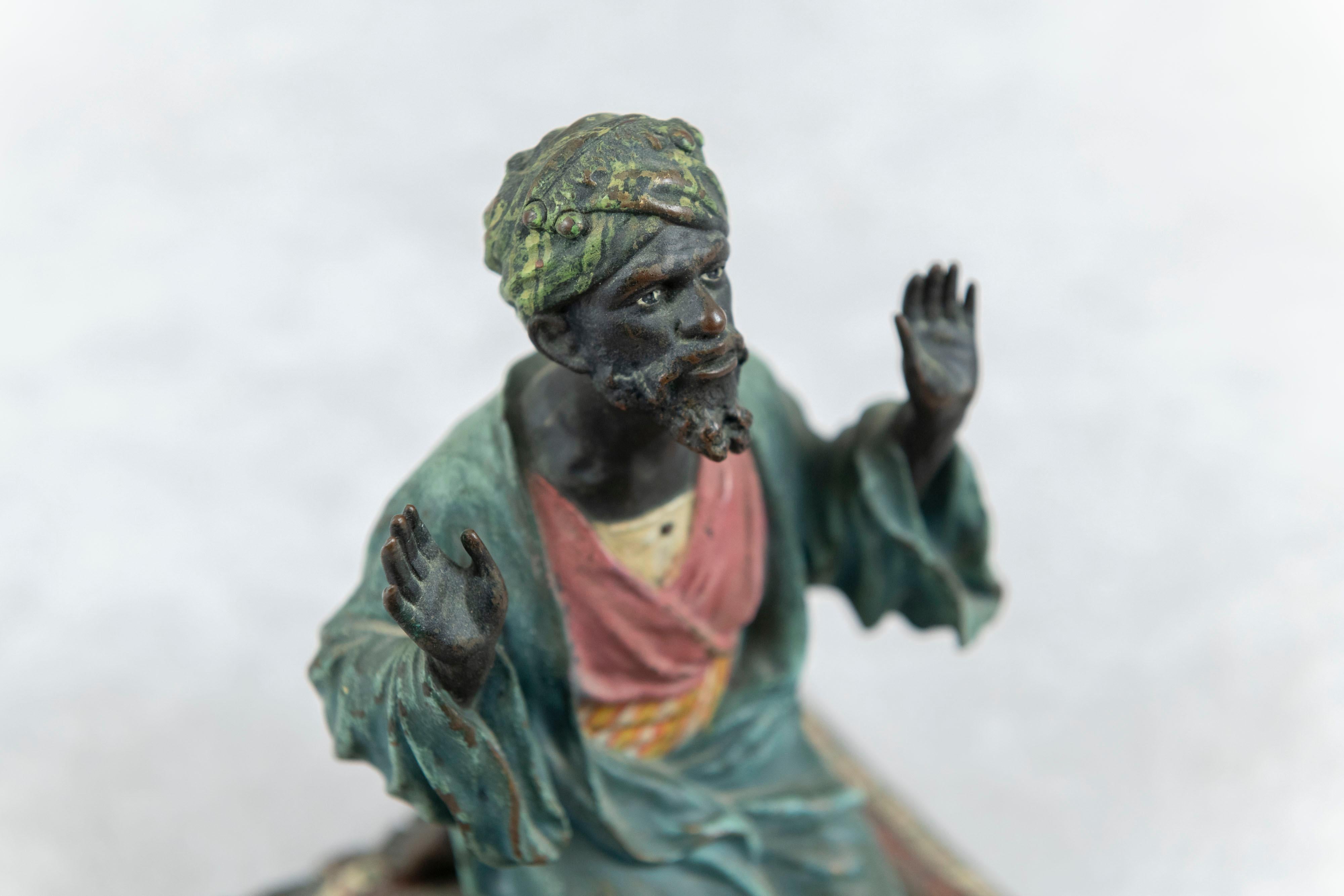 Austrian Cold Painted Vienna Bronze Orientalist Man Praying on Persian Rug, by Bergmann For Sale