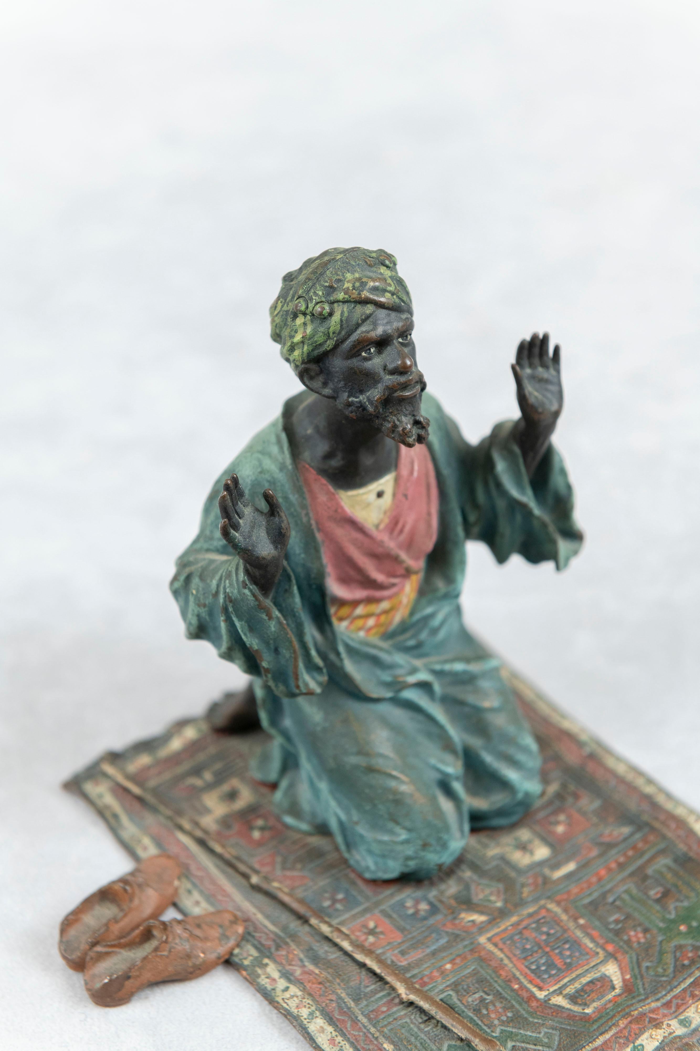 Cast Cold Painted Vienna Bronze Orientalist Man Praying on Persian Rug, by Bergmann For Sale