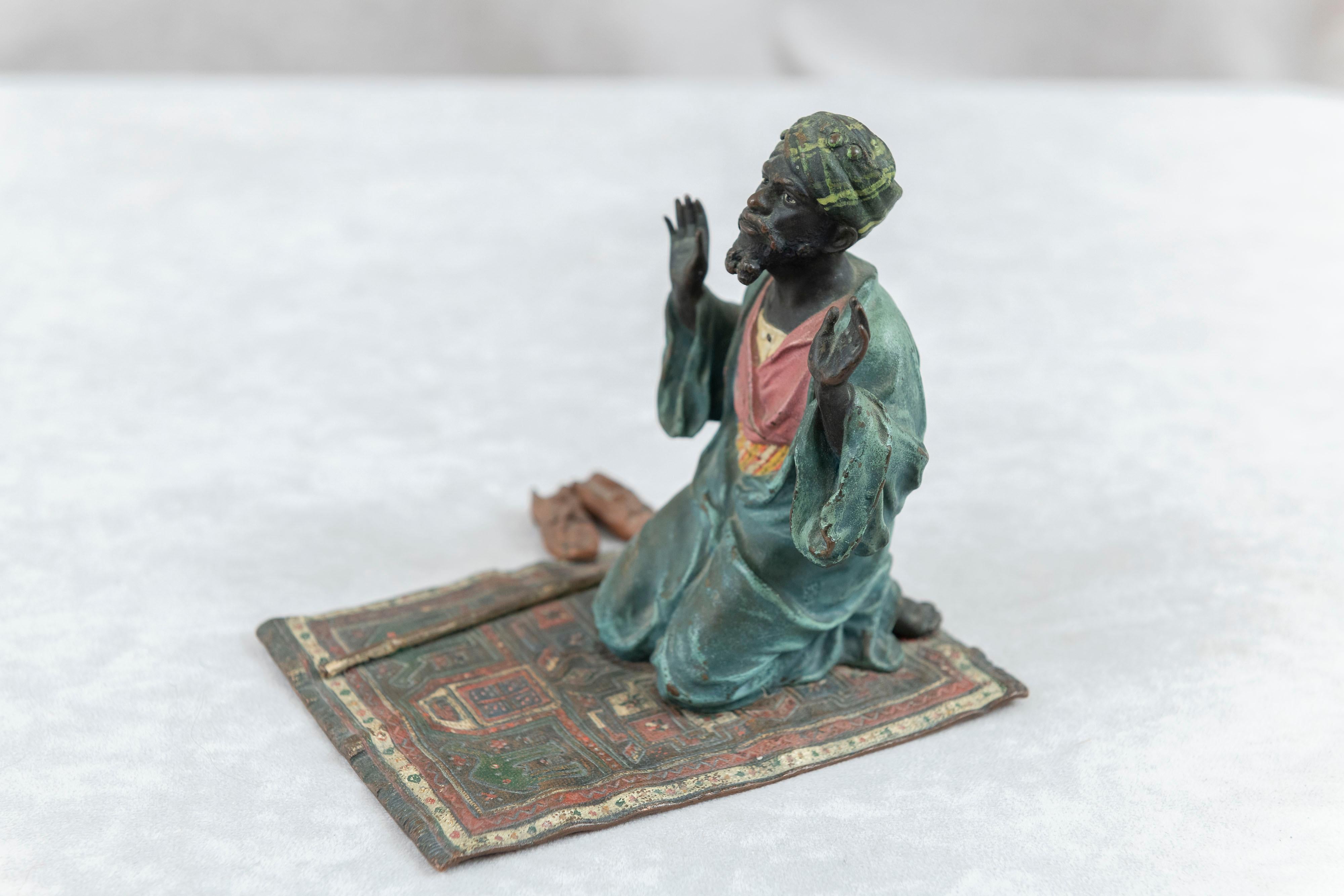 20th Century Cold Painted Vienna Bronze Orientalist Man Praying on Persian Rug, by Bergmann For Sale