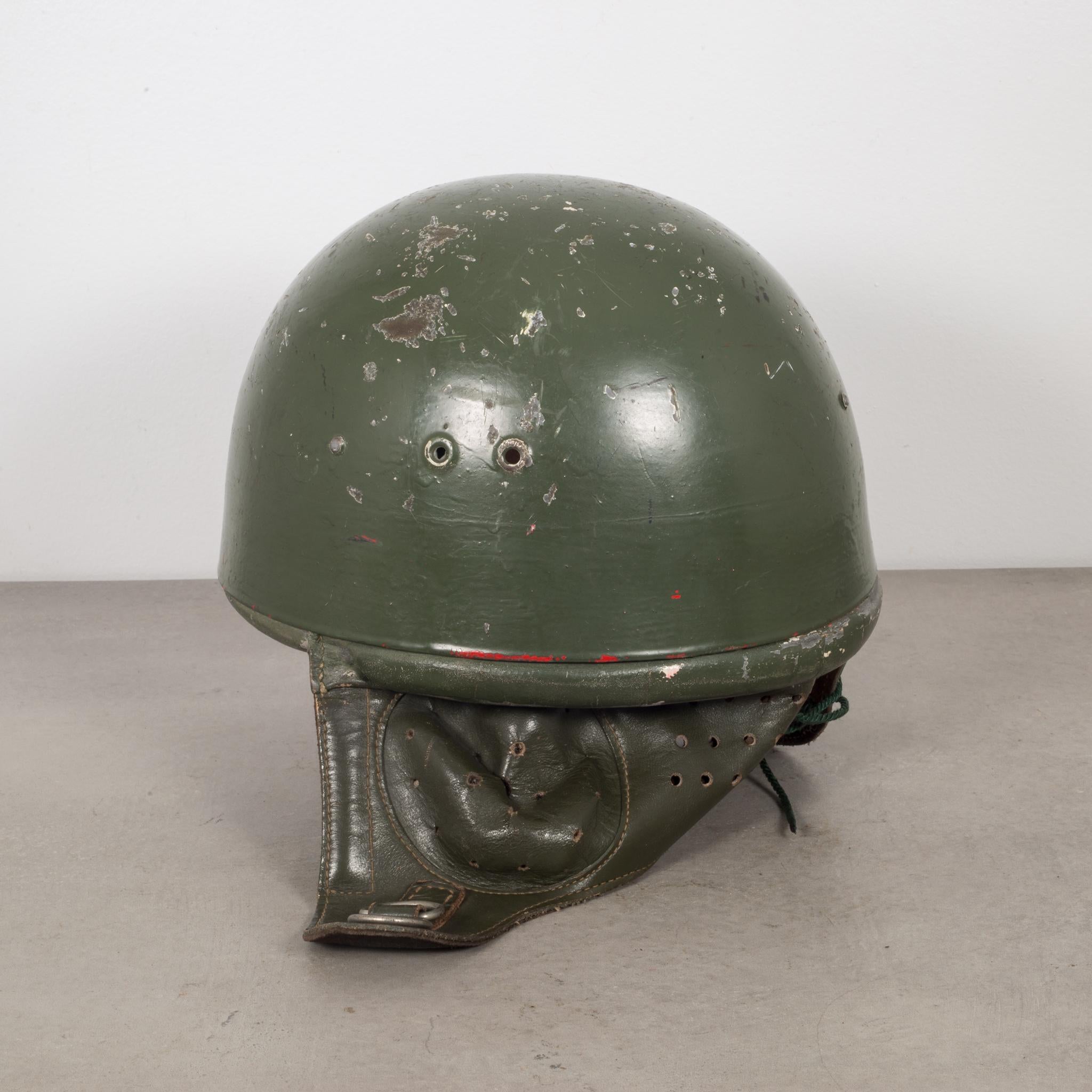 About

This is an original green Polish paratrooper helmet with wrap around leather chin and neck strap. This helmet has retained much of its original finish.

Creator polish military, Poland.
Date of manufacture circa 1950.,
Materials and
