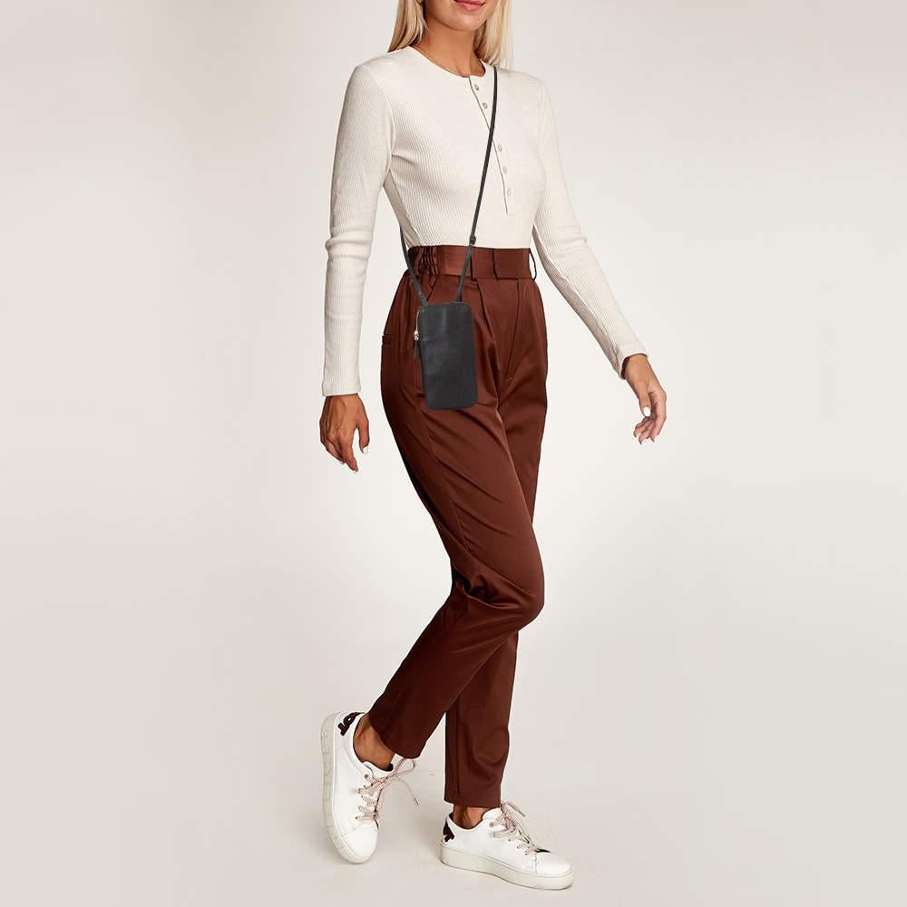 Designed to be durable this lovely crossbody bag is a prized buy. Chic and easy to carry the creation comes with a long shoulder strap and a spacious interior to keep your essentials safe.
