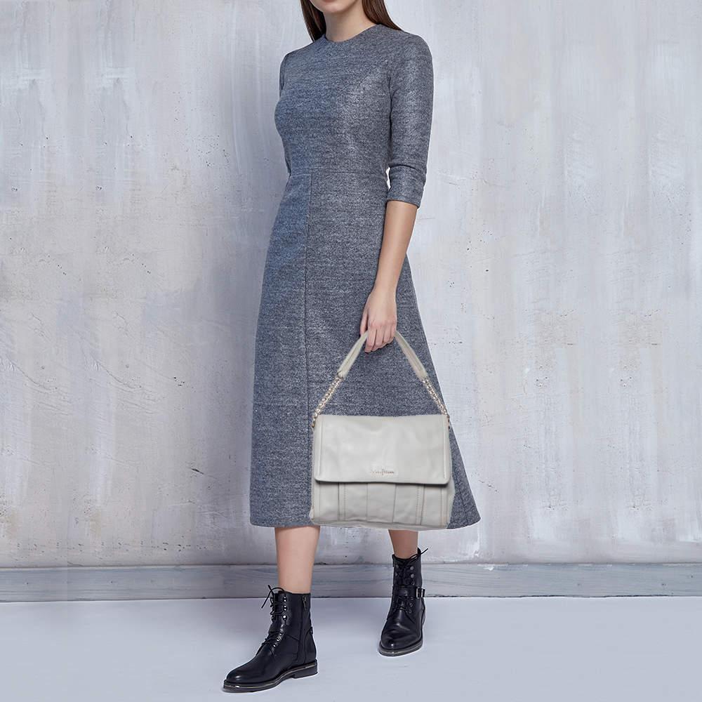 Designer bags are ideal companions for ample occasions Here we have a fashion meets functionality piece crafted with precision. It has been equipped with a well sized interior that can easily fit all your essentials.