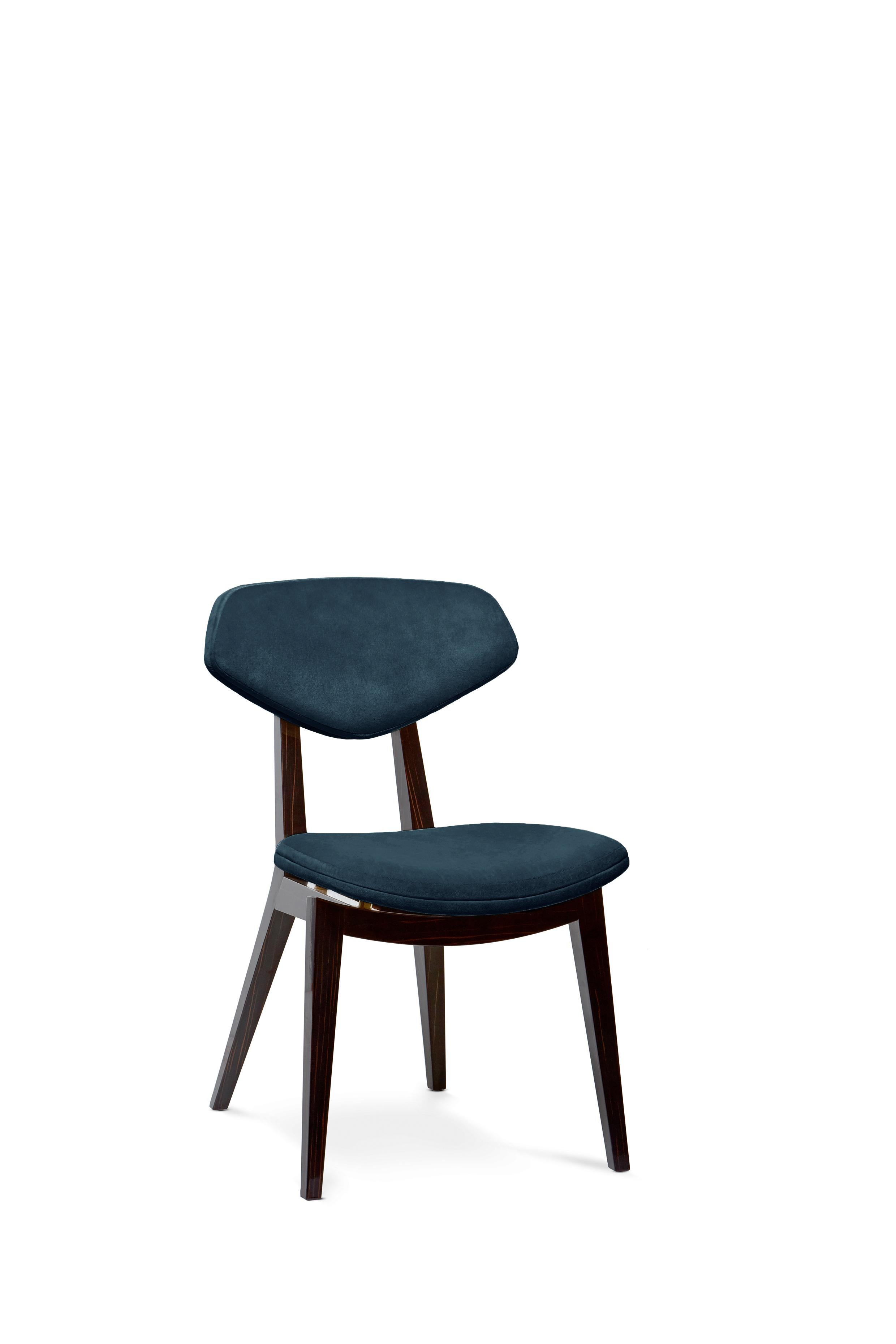 Silla Coleman de Munna
Dimensiones: P 63 x An 48 x Al 81 cm. SH: 49 cm.
Materiales: Madera, espuma, latón y tapicería.
Acabado: Trevira Tapizado de terciopelo, chapa de madera de ébano acabado con barniz brillante y latón cepillado. 

Disponible en