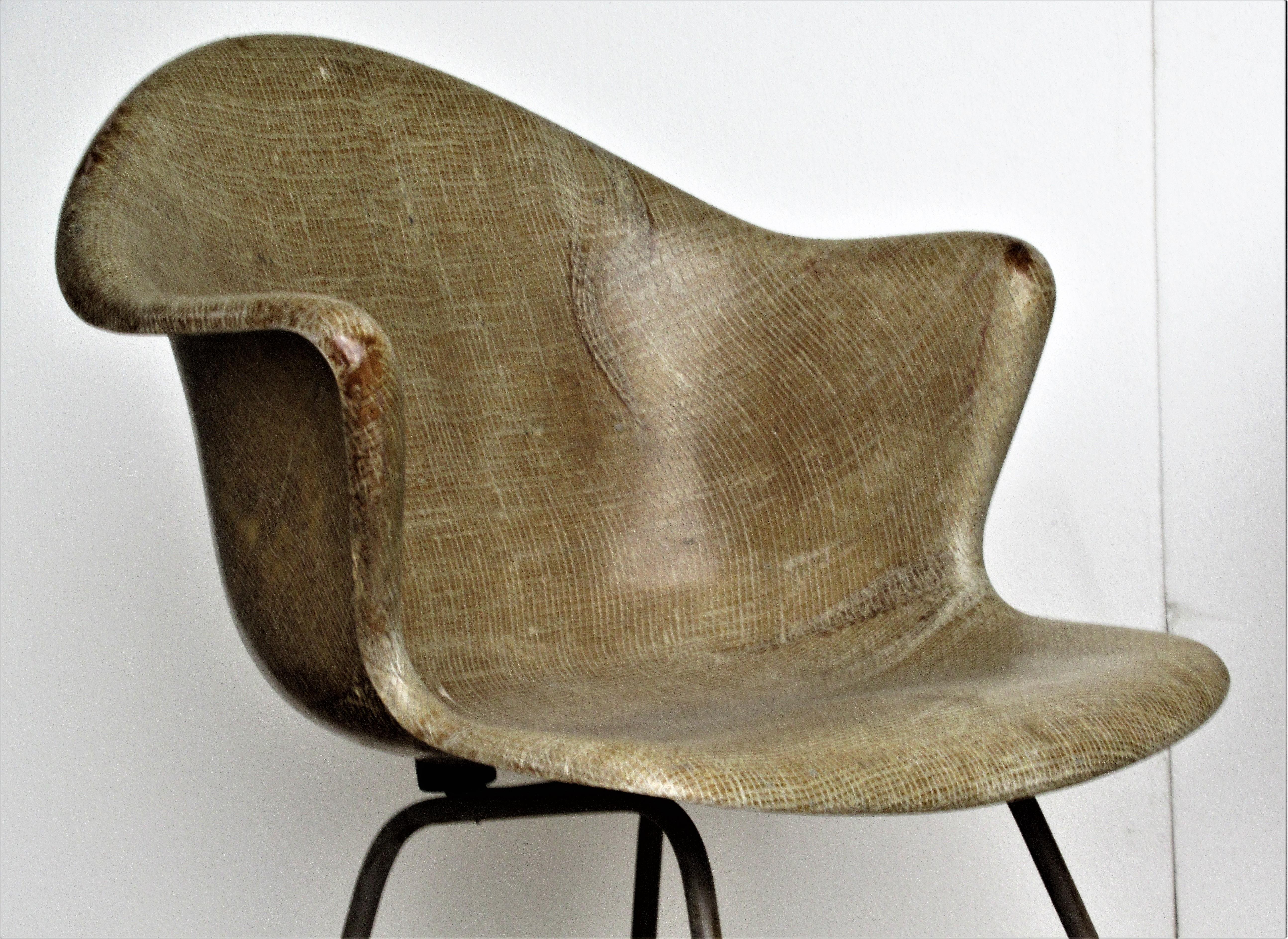 Pair of great looking sculptural textured khaki fiberglass burlap bucket chairs with beautifully aged surface color. Chairs are not signed but are manufactured by Coles Steel and attributed to Luther Conover, circa 1950s. ****** Parcel shipping