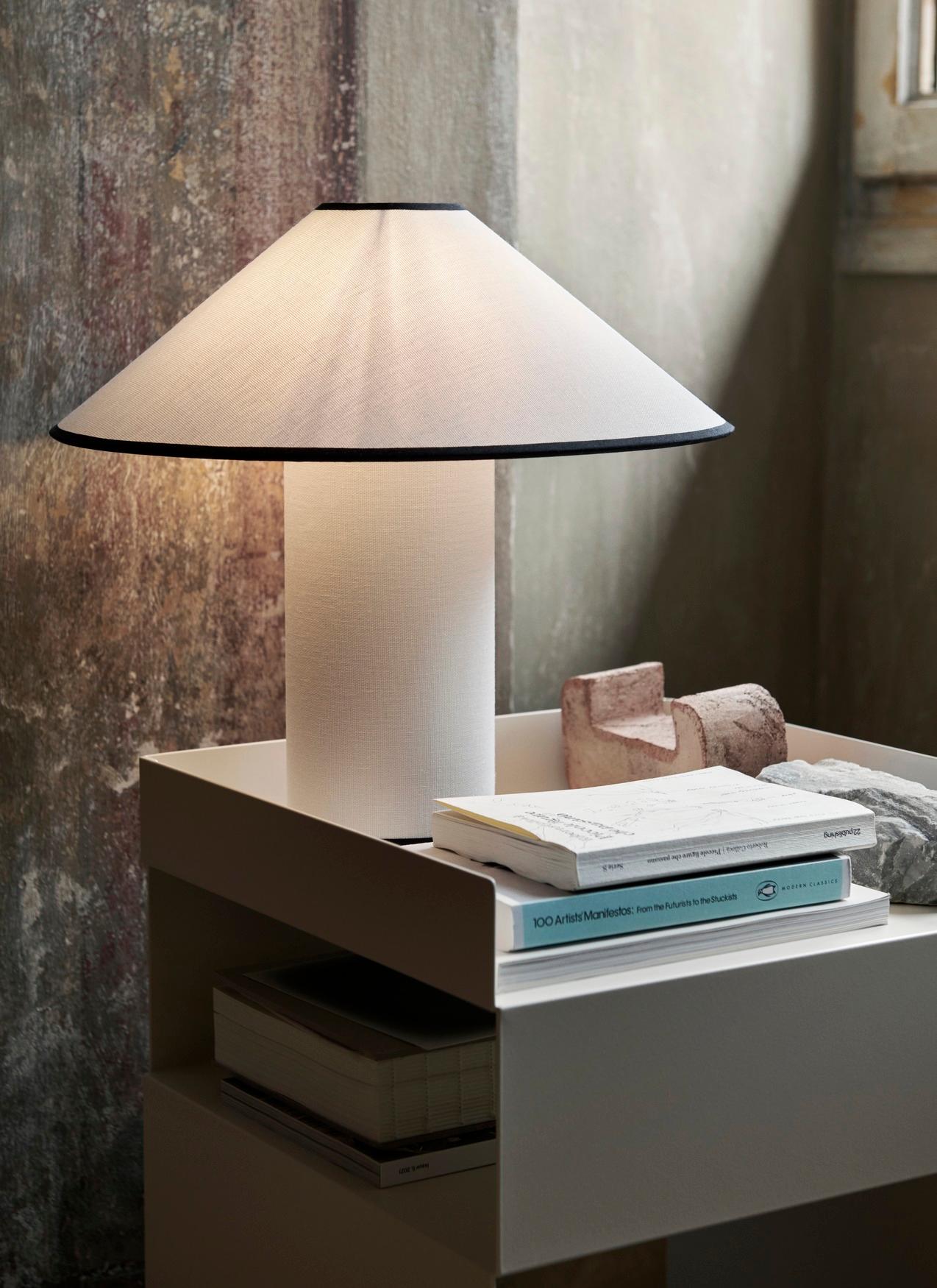 Named after the famed and pioneering French author known simply as ‘Colette’, &Tradition’s new table lamp has an avant-garde aesthetic. Showcasing a tactile shade and base fully encased in a crisp, off-white cotton-linen blend, this dimmable lamp is