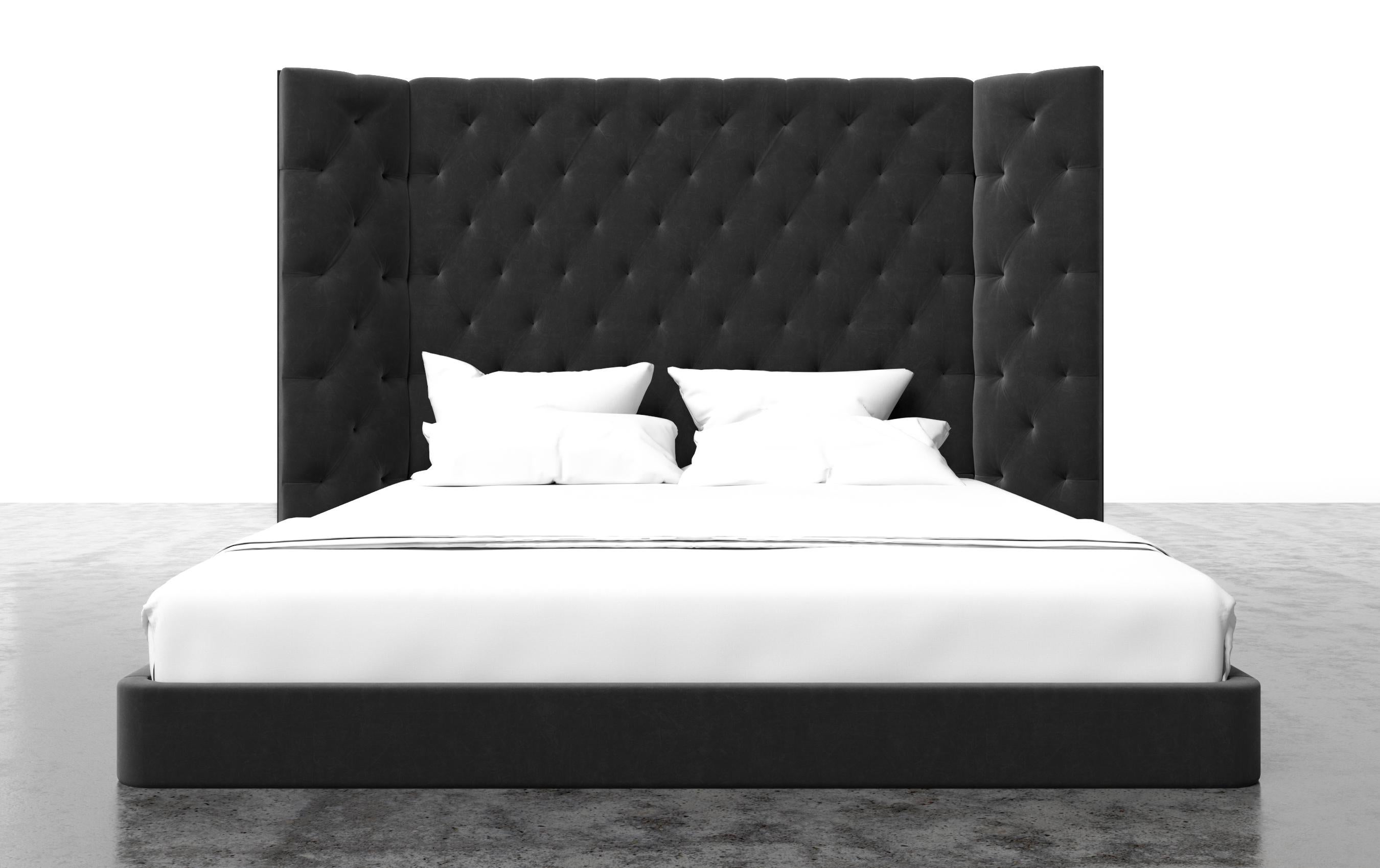 The Colette bed features a modern tufted upholstered headboard on a modern platform with winged arm details. Available in King, Cali King, Queen or Twin sizes. Fully custom and made to order in California. As shown in Queen size in Luxury