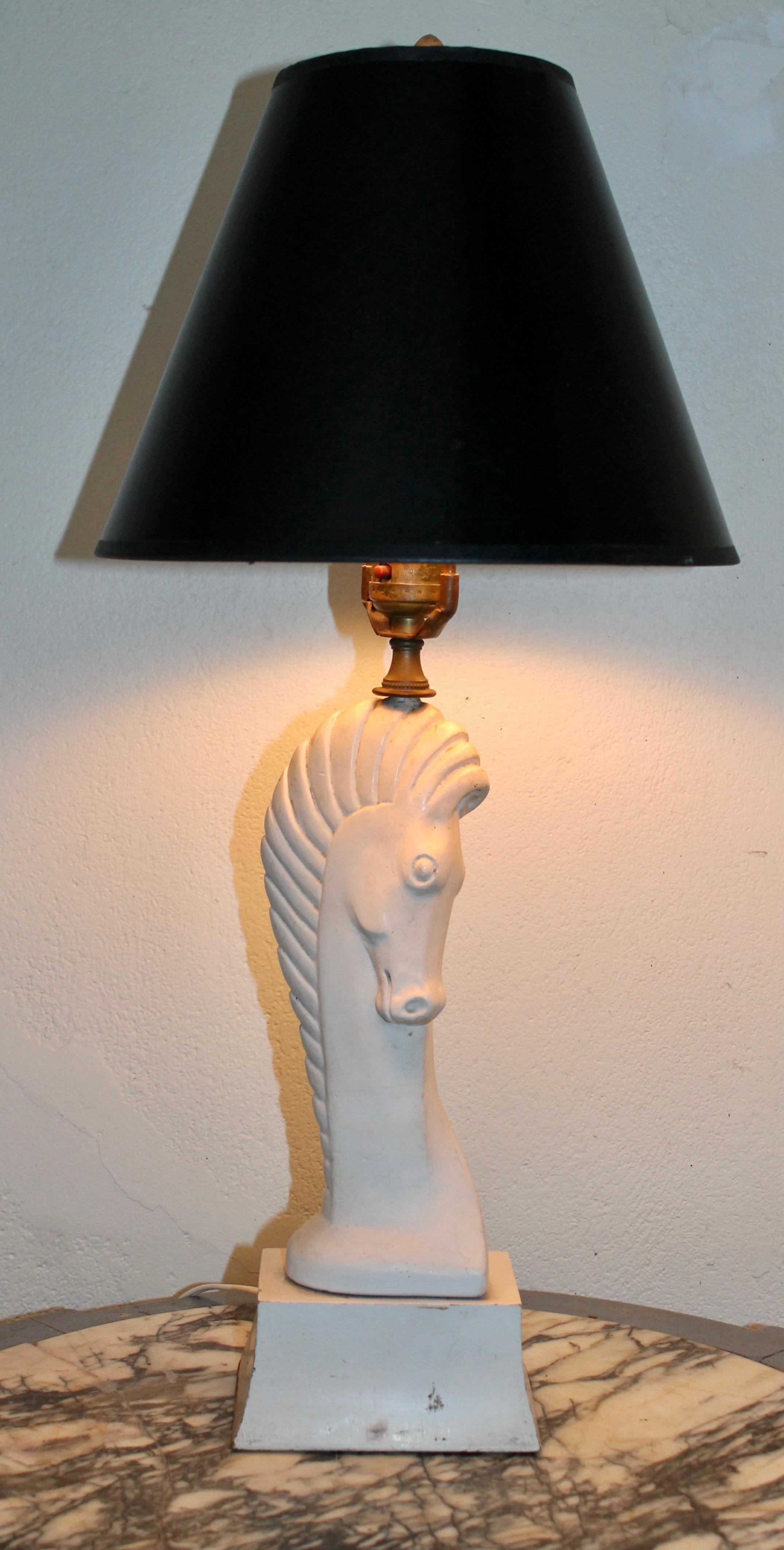 A period modernist plaster horse head in Colette Gueden style on a wood base boudoir lamp. All painted white. Height of lamp base 13.25