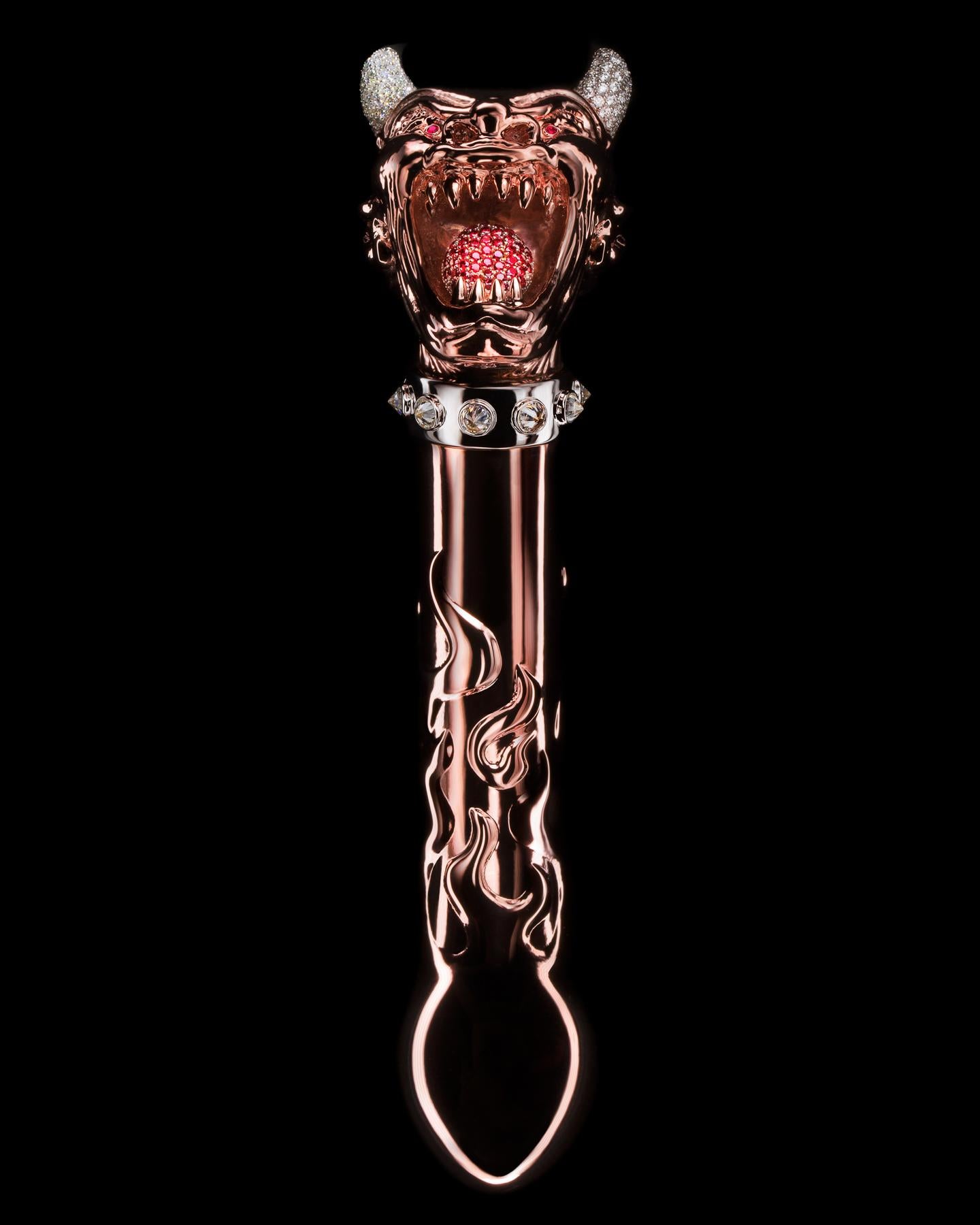 "Lucifers Limit" 18K Gold Sculpture 8' x 2' in Edition of 10 by Colin Burn

Rose Gold, Diamond & Gem Sculpture

NOTE: preparation time may take up to 8 weeks.

The Lucifer devil olisbos sculpture is formed with pure 24k gold and finished in 18k rose