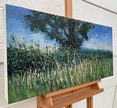 Paesaggio estivo di prato dipinto ad olio con albero da un artista britannico