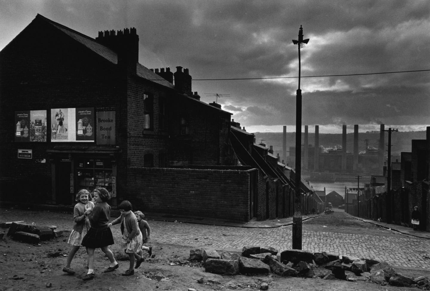 Colin Jones Black and White Photograph - Coal-searchers on a slagheap, Sunderland, England 1962