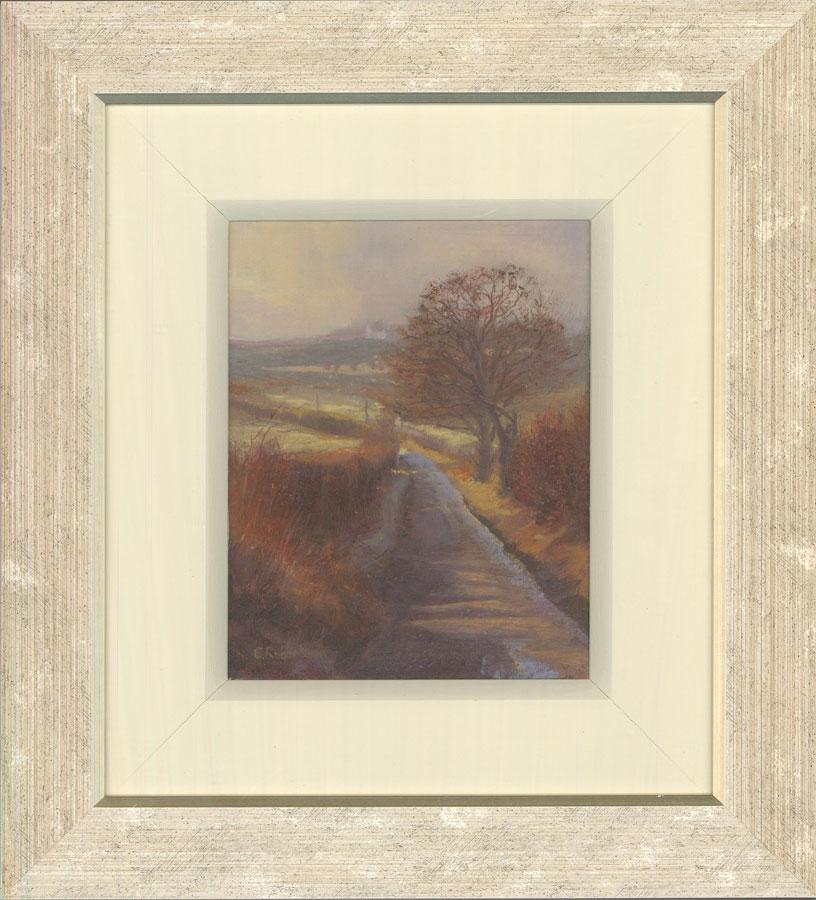 A delightful oil scene of a quiet country road, we can see the orange tones reflected off the sunset and onto the road. Signed to the lower left and well presented in a white slip and modern frame. On board.