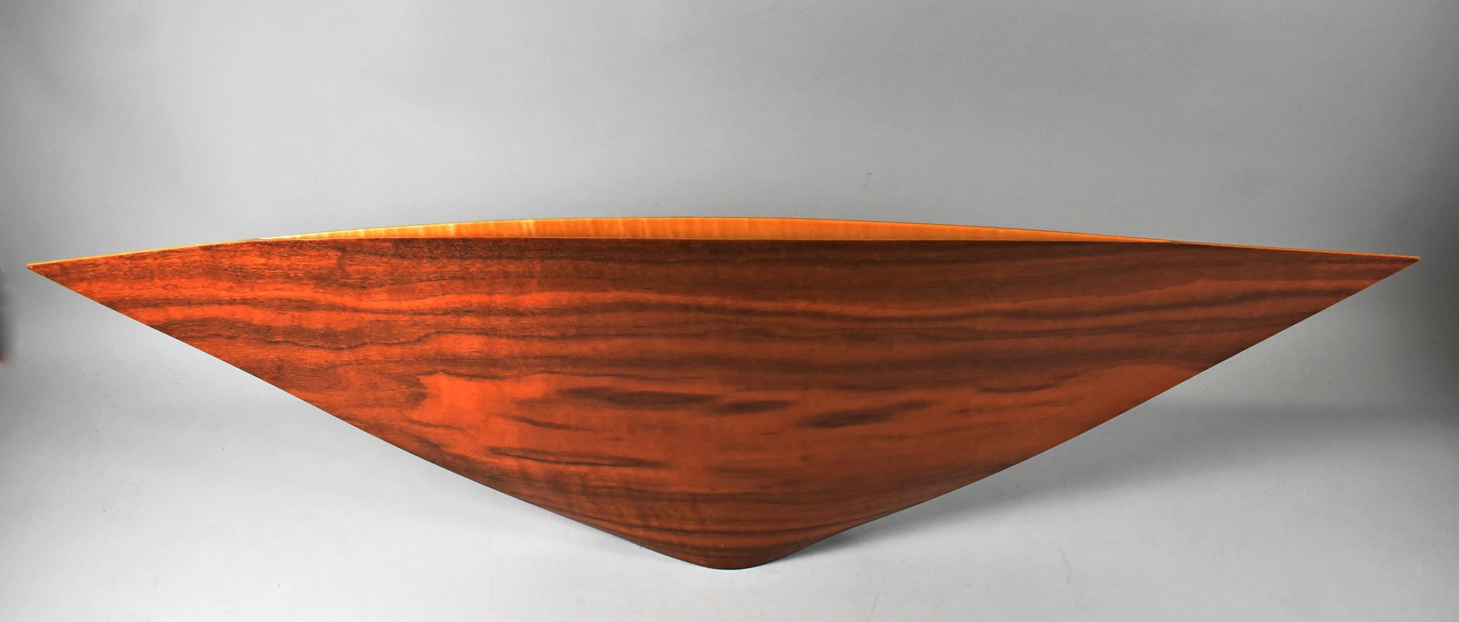 Walnut elongated vessel sculpture by Canadian designer Colin Schleeh (B. 1955) titled 