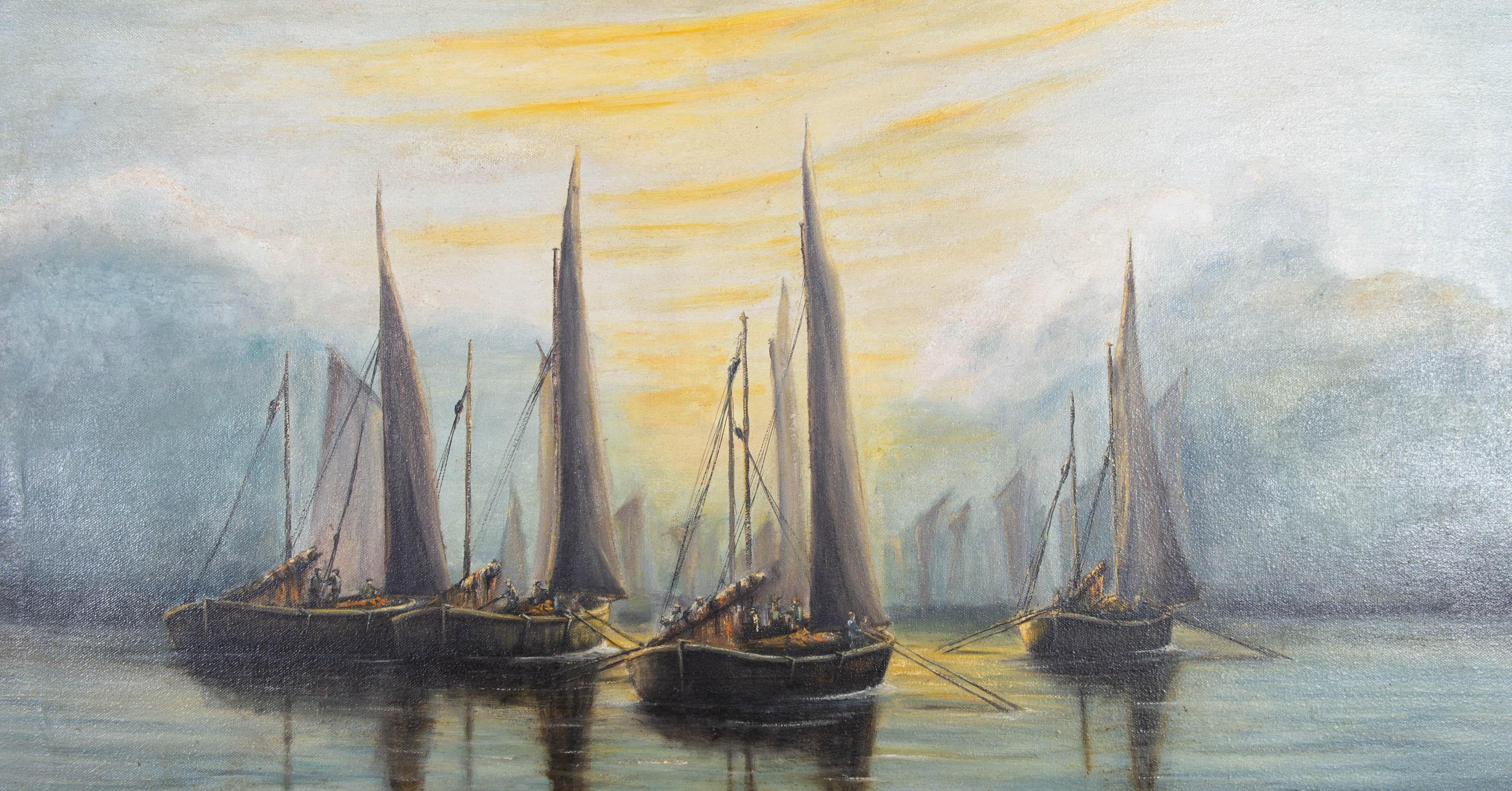 A fine 20th Century nautical scene showing a group of fishing boats on calm waters under a dramatic sky. The artist has signed and dated to the lower right and the painting has been presented in a simple wood frame with tarnished gilt effect. On