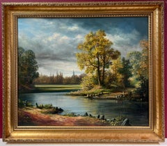 Signiertes britisches traditionelles Ölgemälde einer ländlichen Flusslandschaft unter wolkenblauem Himmel