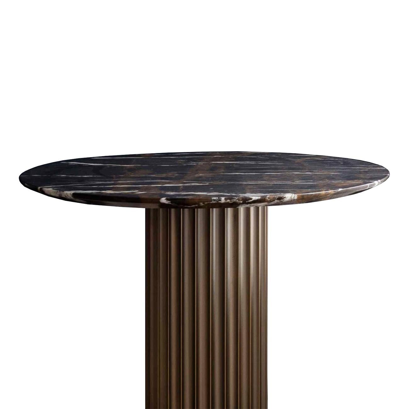 Side table colisee bronze with solid bronze
base and with emperador marble round top.
Measures: Diameter 60cm x height 58cm, price: 3450,00€.
Also available in diameter 50cm x height 58cm, price: 3250,00€.
Also available with glossy gold base with