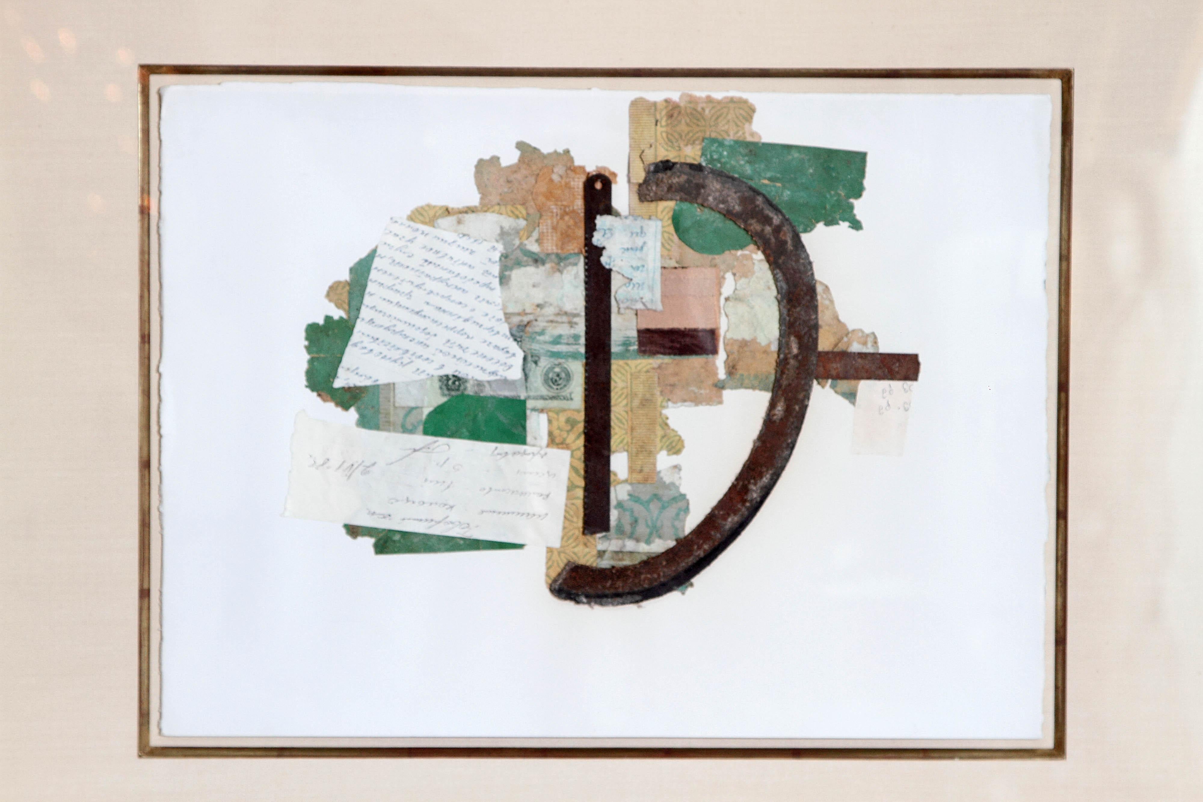 A unique non-objective collage using a variety of materials; torn letters, colored papers and metal. The composition is multicolored on a white matte within a gilt border. The frame is ribbed gilt with acanthus leaf carved corners.
