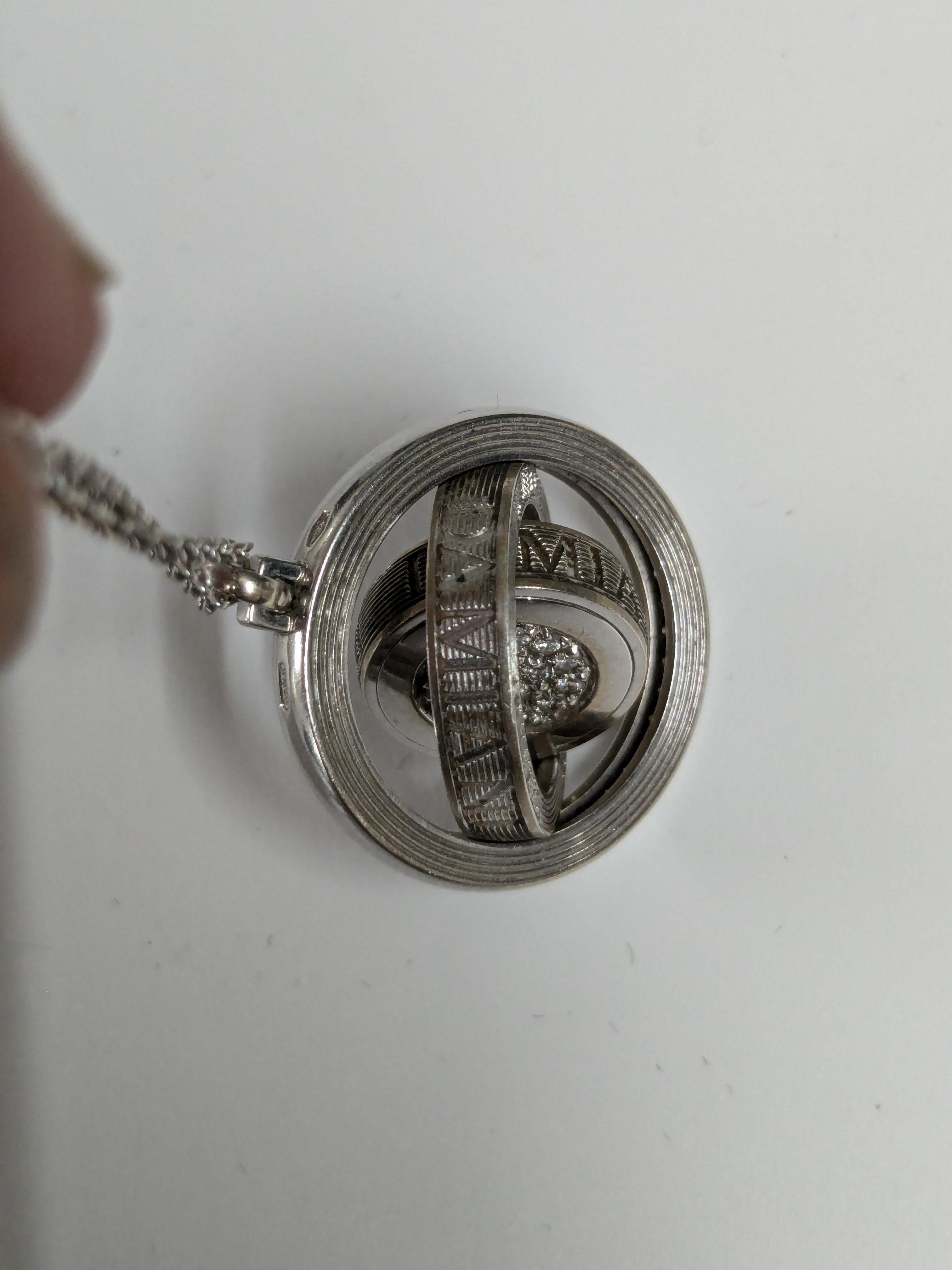 Women's or Men's Damiani Orbital collection pendant necklace in white gold and diamonds For Sale