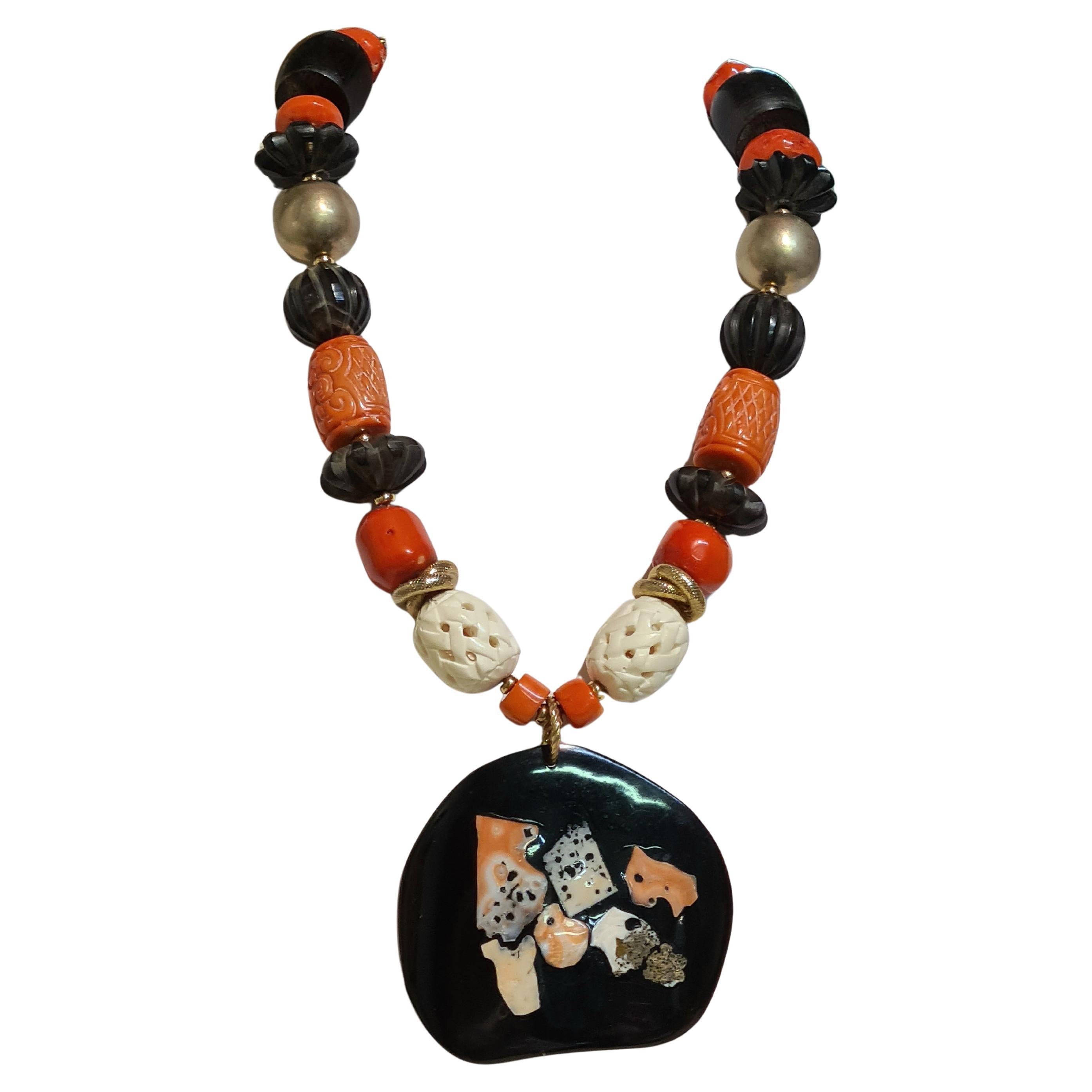 Fantasy necklace with Horn Plate and Inlaid Coral For Sale