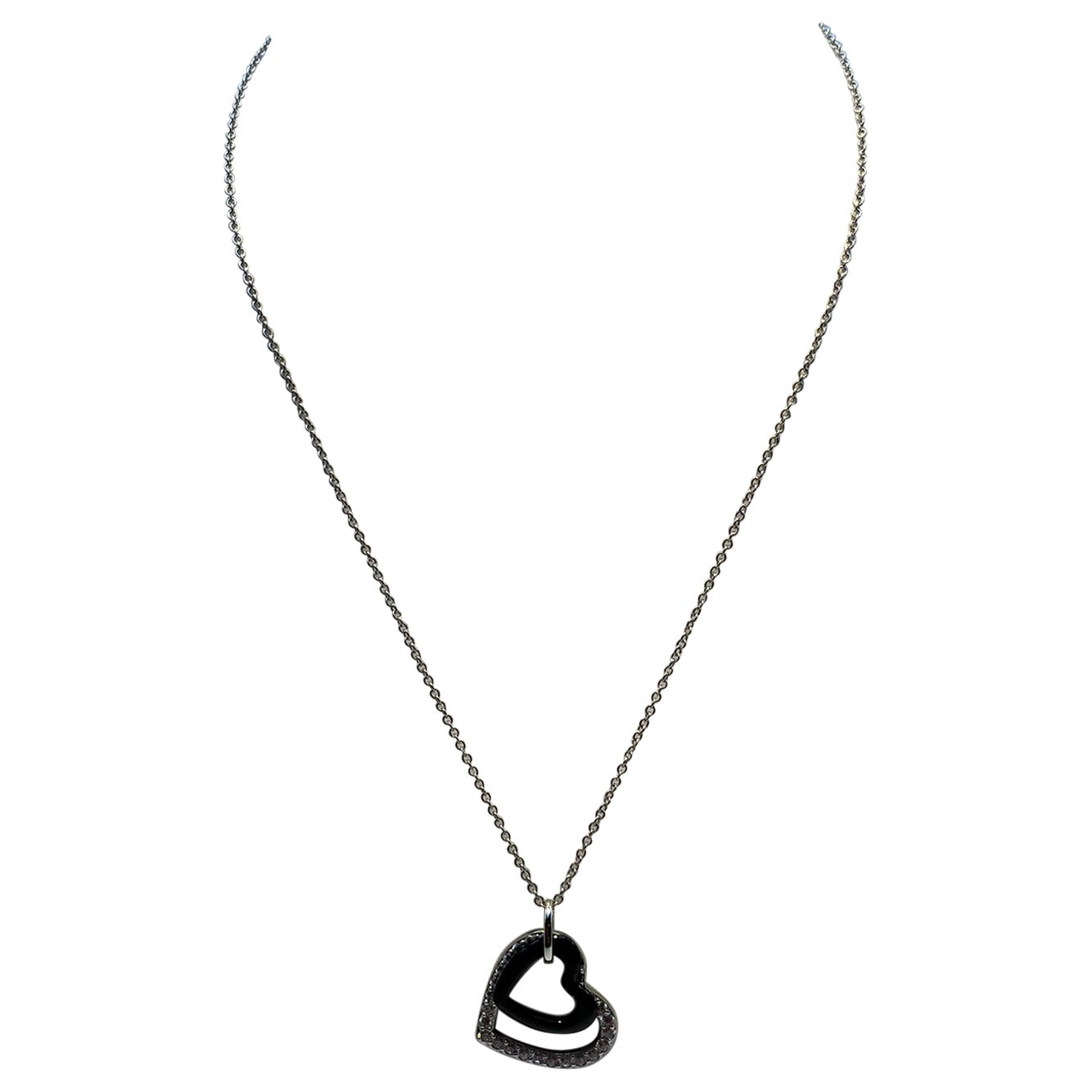 Collana in argento 925 con due ciondoli a cuore con ceramica nera e zirconi