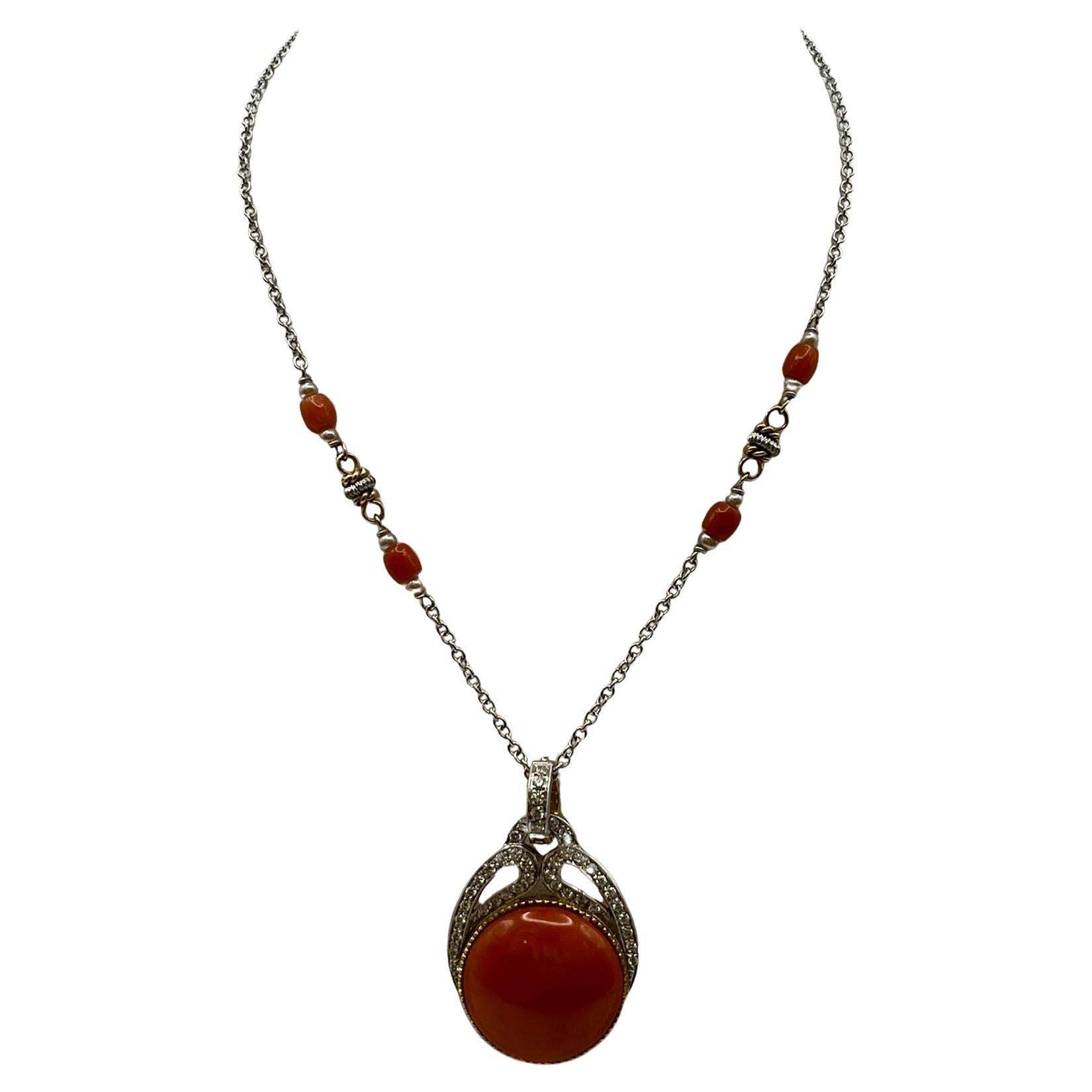 18 kt. white and yellow gold necklace with Japanese coral pendant
