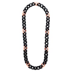 Collana lunga con maglie rotonde in oro rosa 18 carati ed ebano