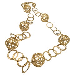 Collana lunga collezione Sfera Disco Traforato preistorico