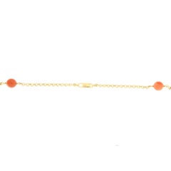 Collana lunga in oro giallo 18 kt. con sfere in corallo, perle e quarzi lemon