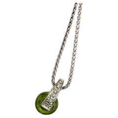 Collana Oro Bianco “Double Face”  Brillanti e Peridoto verde