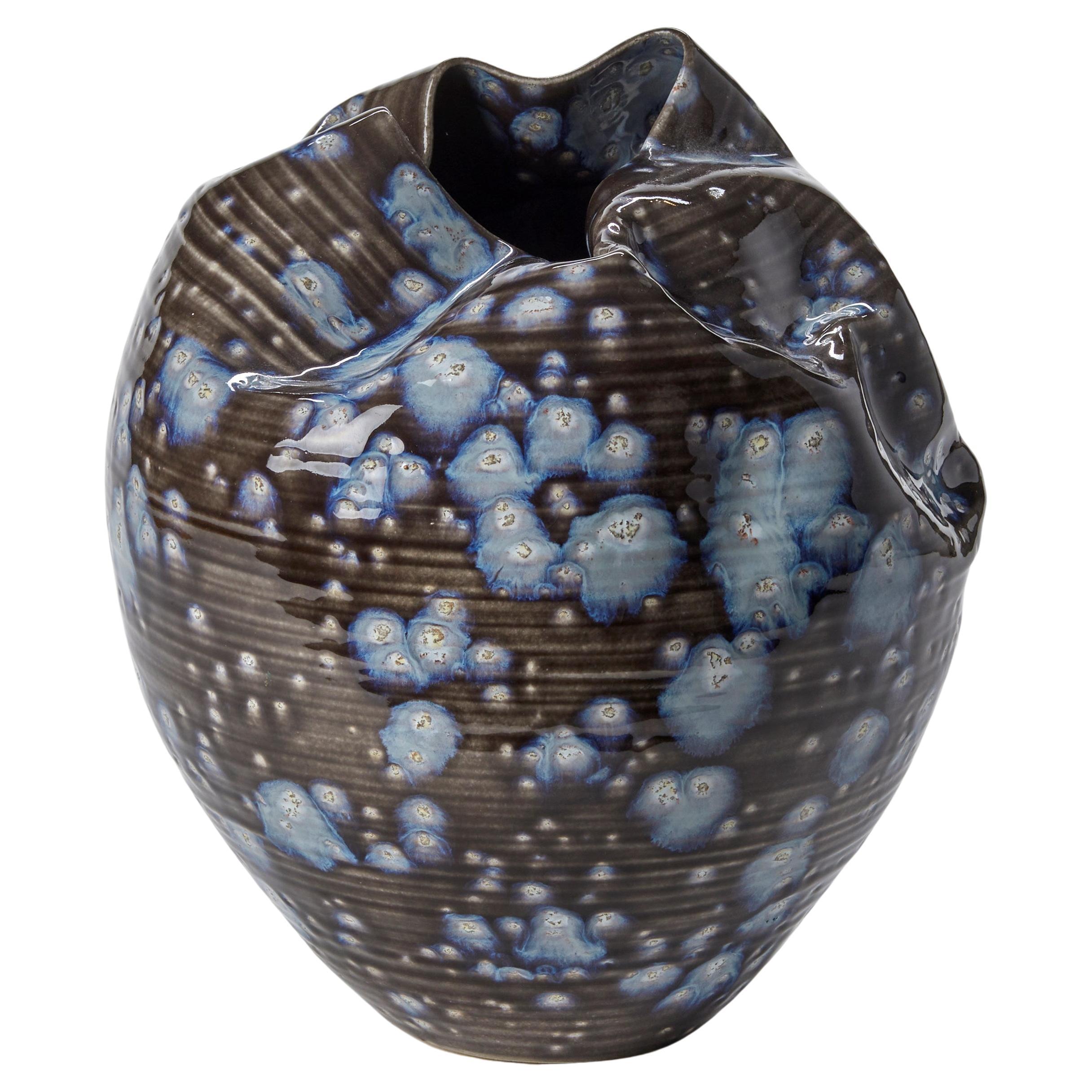 Collapsed Form with Blue Explosions No 73, vessel by Nicholas Arroyave Portela