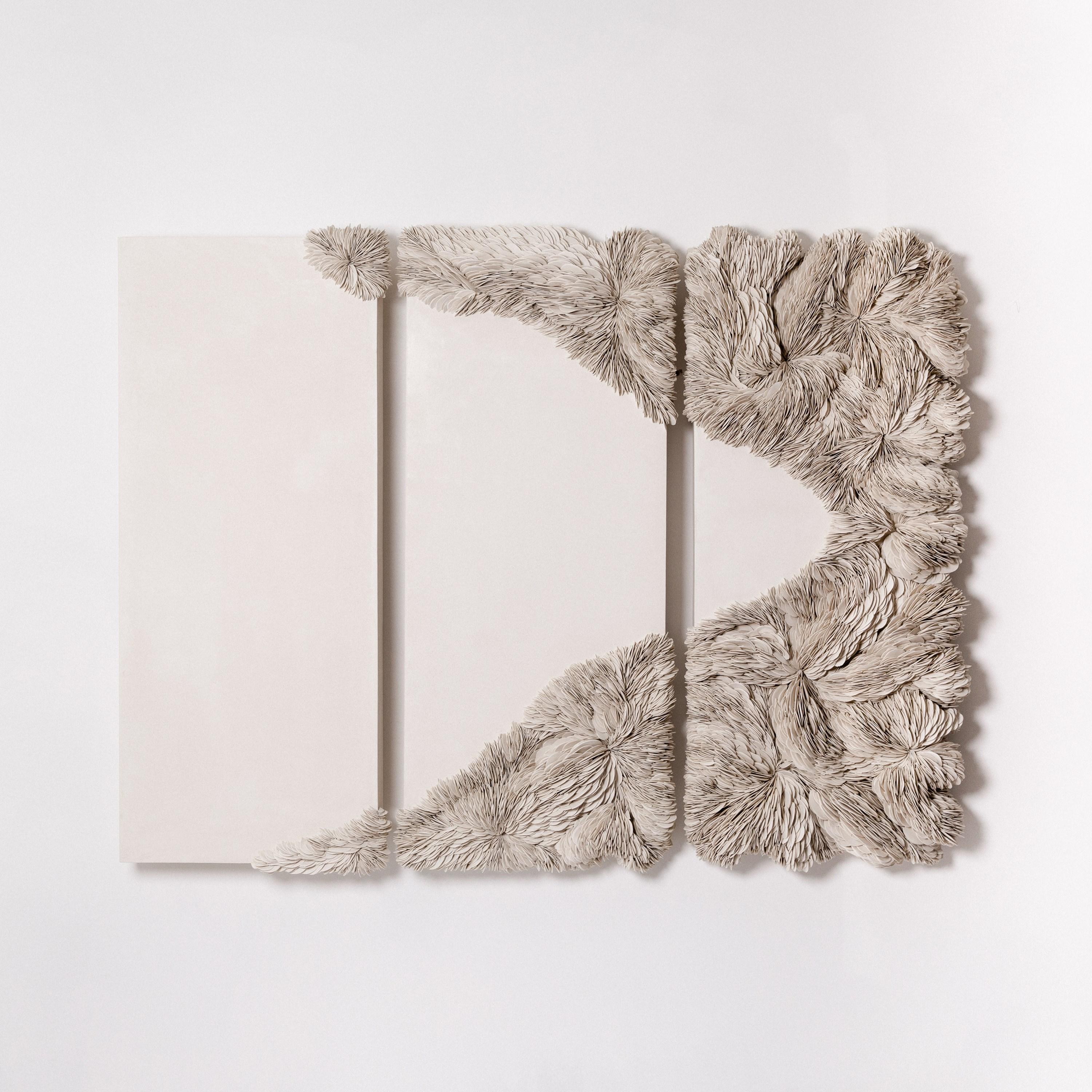 'Collapsed Triptych in Sand' is a unique wall-mounted sculptural artwork by the British artist, Olivia Walker. It has been created from coloured porcelain, tadelakt plaster and resin. The dimensions above are for the three panels.

Walker works in