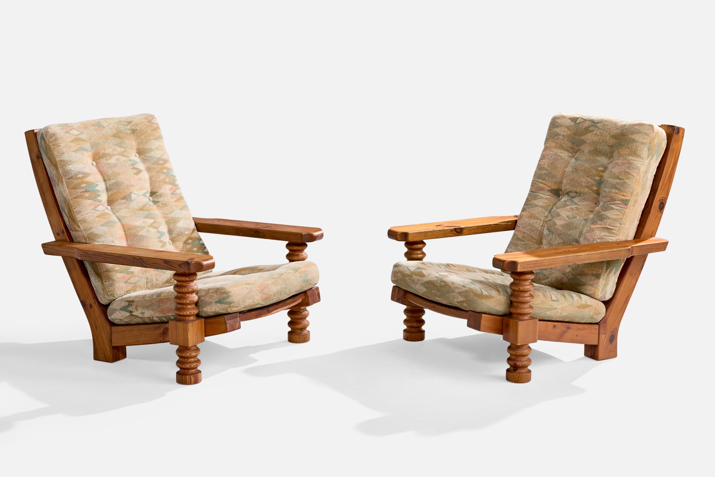 A pair of pine and fabric lounge chairs produced by Collden, Sweden, c. 1970s.

Dimensions (inches): 35.75” H x 33.25” W x 38.75” D

Seat Height (inches): 14” 

Arm Height (inches): 18.5”

All upholstered furniture can be reupholstered upon request