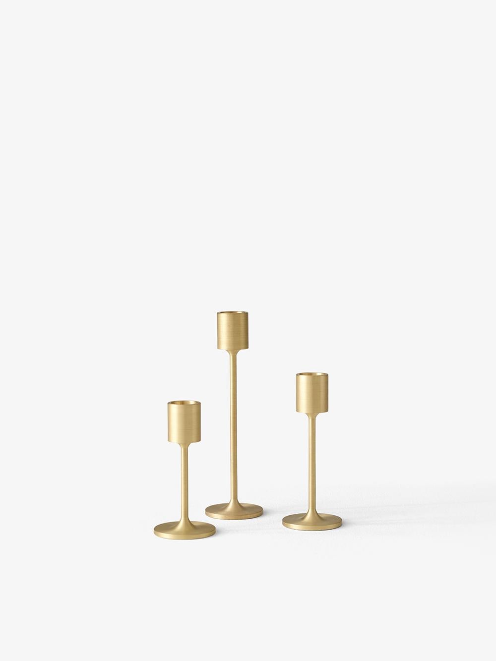 Inspired by the striking simplicity of Doric columns found in Ancient Greece, this gleaming brushed brass candleholder is a sculptural addition to the home. 
It is the biggest of the Collect cardholders, designed by Space Copenhagen.
