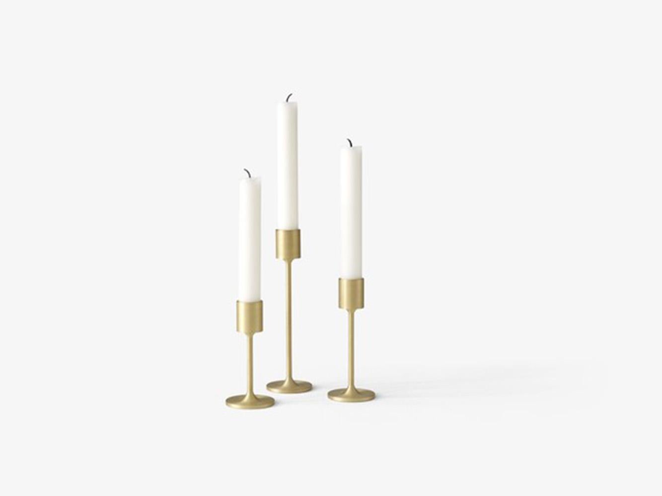 Inspired by the striking simplicity of Doric columns found in Ancient Greece, this gleaming brushed brass candleholder is a sculptural addition to the home. 
It is the smallest size of the collect cardholders, designed by Space Copenhagen.