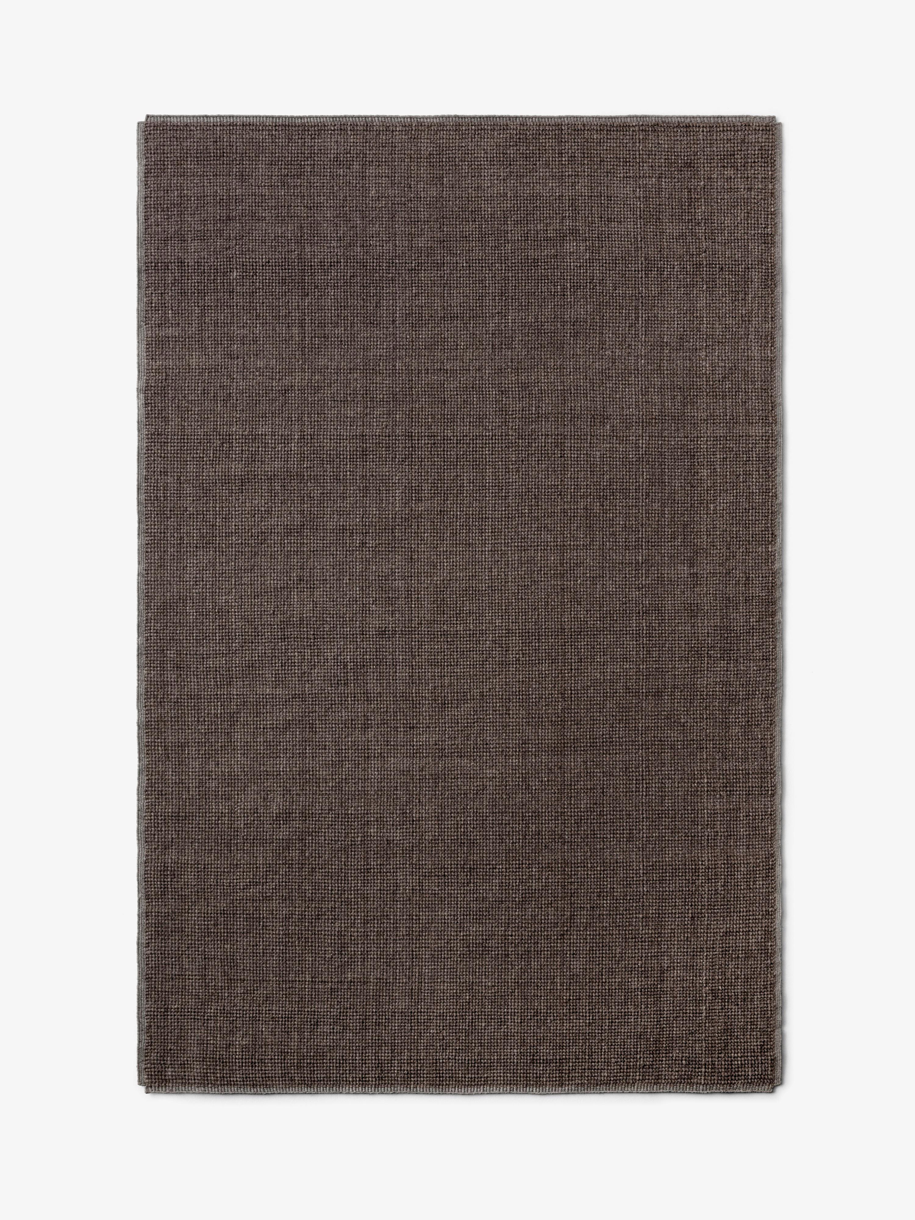 The Collect rugs are crafted by skilled artisans in Bikaner, India, with the undyed natural wool woven on a handloom. The work and expertise invested into each rug underscores the artistry of the piece that can be found in both Collect's design as
