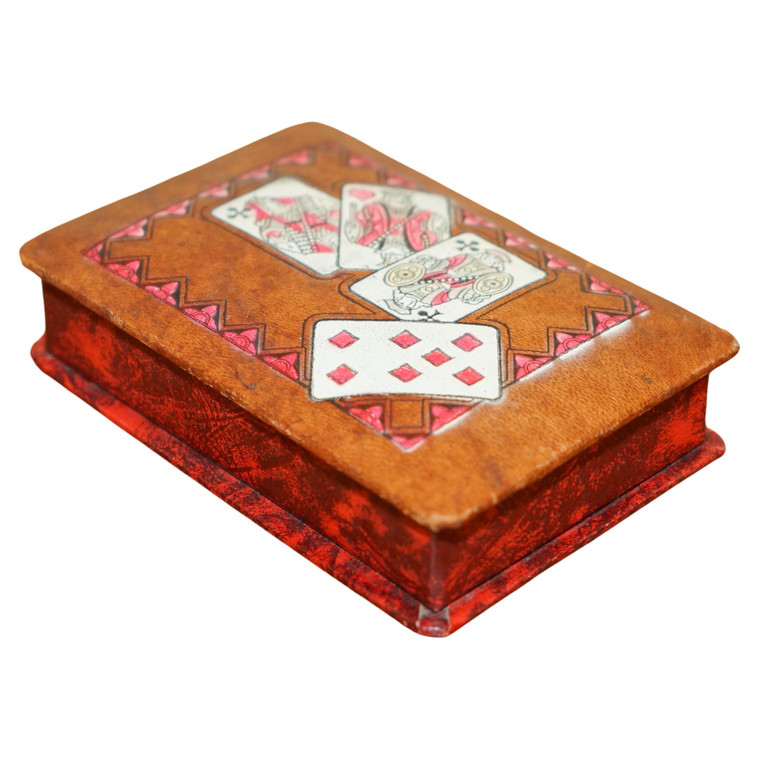 Royal House Antiques

Royal House Antiques is delighted to offer for sale this super collectable antique Napoleon III leather embossed and hand painted card games box

A very good looking and decorative little box, the top is embossed leather which