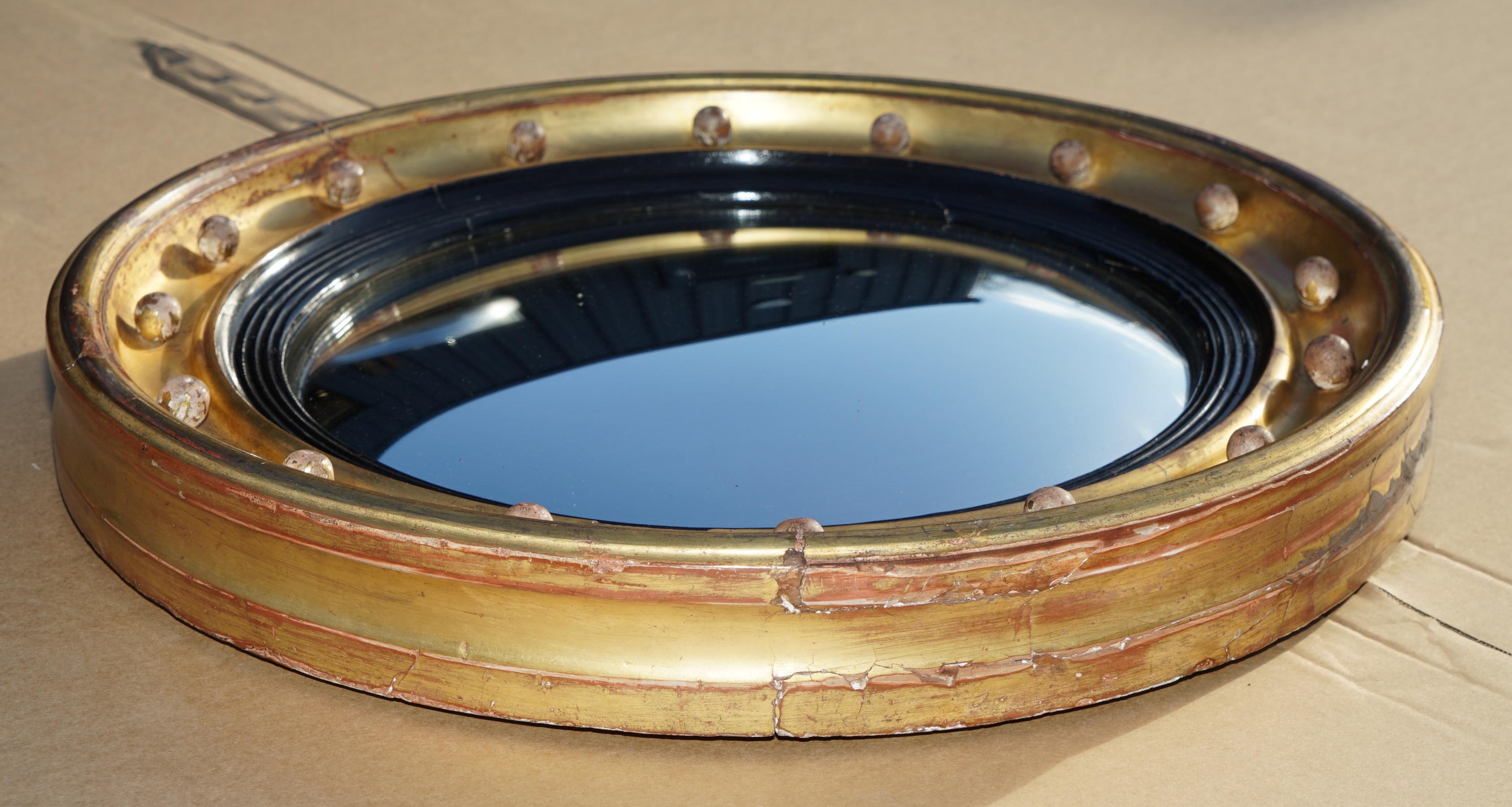 Royal House Antiques

Wimbledon-Furniture is delighted to offer for sale this very nice Regency wall mirror circa 1810-1820 with hand carved giltwood frame and convex butlers glass 

Please note the delivery fee listed is just a guide, it covers